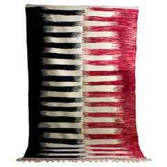 Vintage folk art wool berber rug with zig zag pattern in black and red