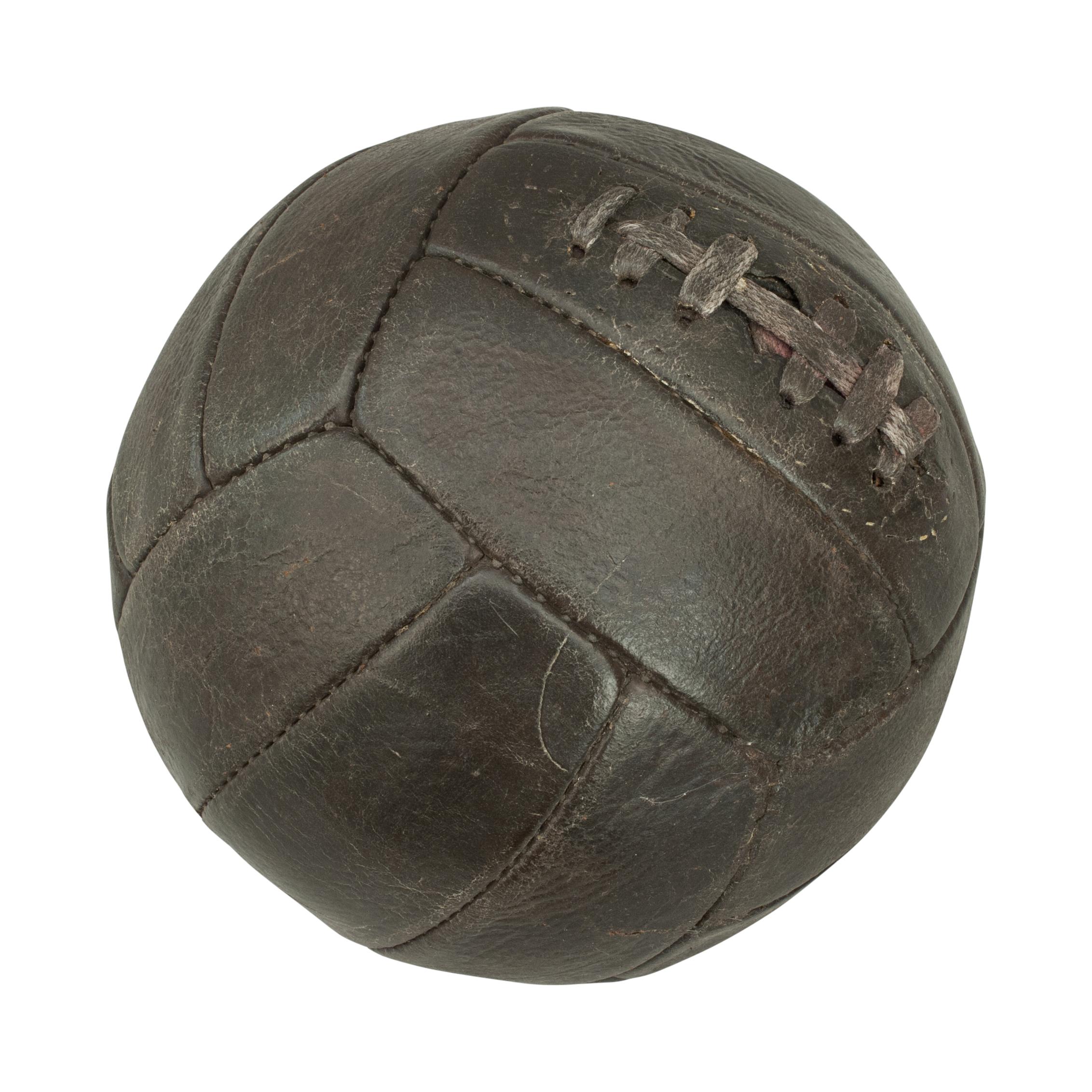 Vintage leather football.
A traditional 18-panel leather football in good condition. The ball has a lace-up slit to the top to enable bladder inflation.