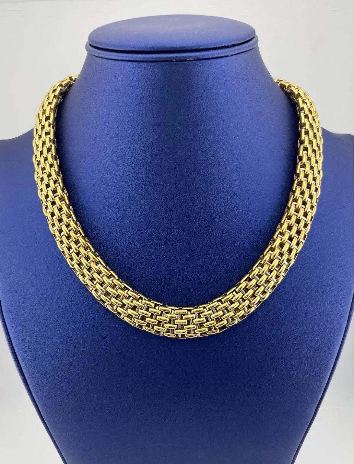 Elevate your jewelry collection with this timeless vintage piece from FOPE, the renowned Italian luxury jeweler known for craftsmanship and elegance. This exquisite necklace is crafted in rich 18kt yellow and white gold, featuring FOPE's signature