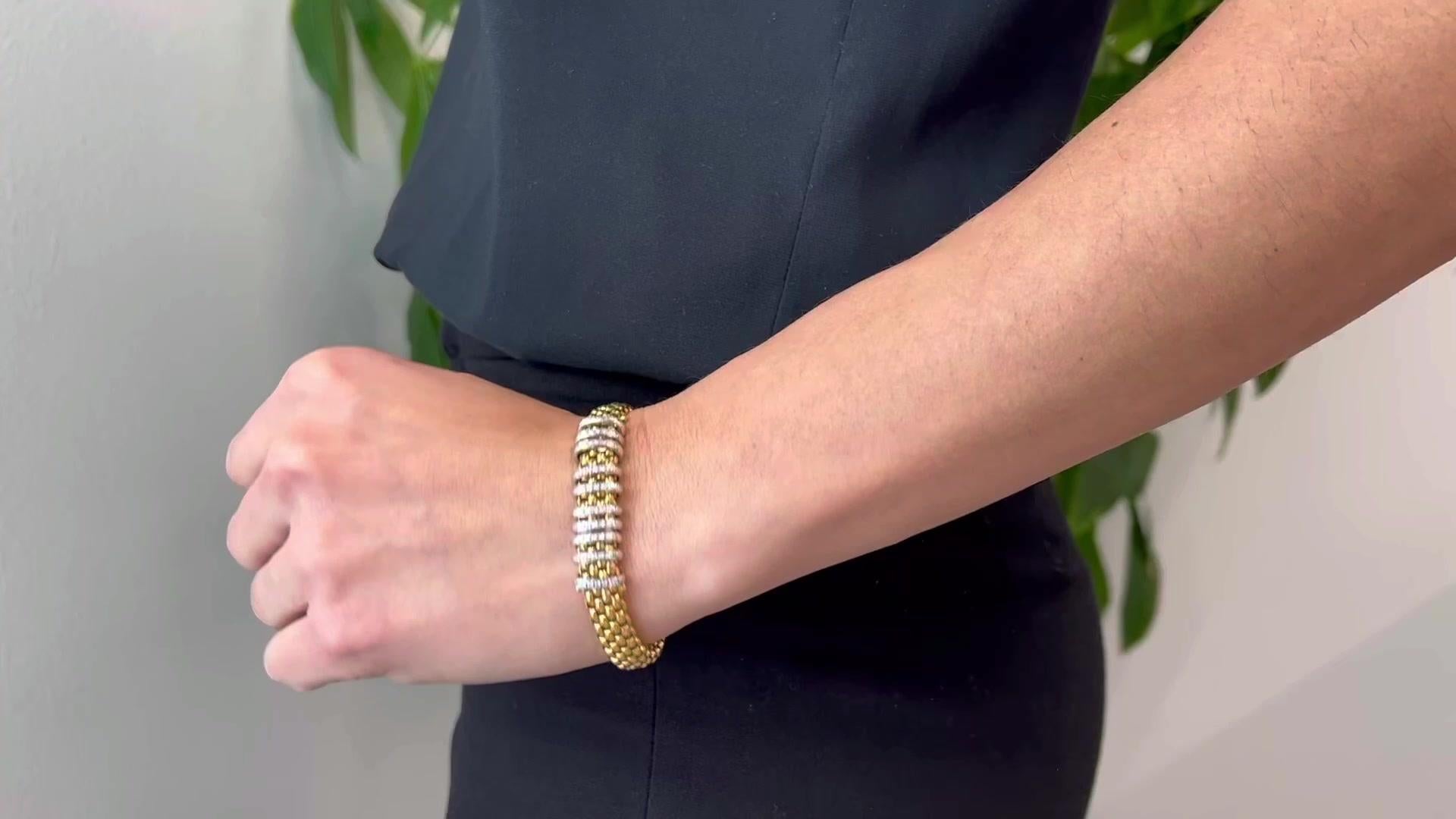 One Vintage Fope Italy Diamond 18 Karat Gold Panorama Bracelet. Featuring 50 round brilliant cut diamonds with a total weight of approximately 0.75 carat, graded colorless, VS clarity. Crafted in 18 karat gold, signed Fope with Italian hallmarks.