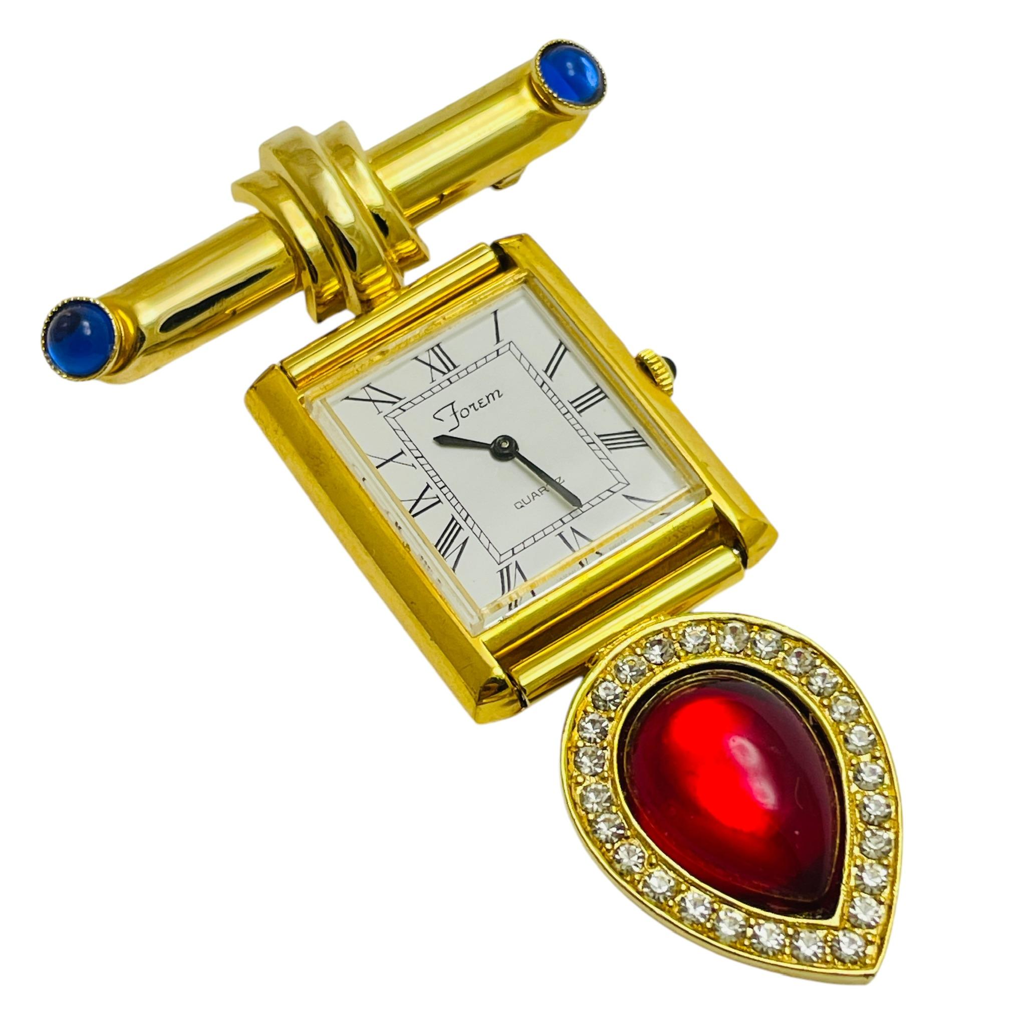 DETAILS

• signed FOREM 

• gold tone with glass cabs

• vintage designer watch brooch 

MEASUREMENTS  

• 

CONDITION

•  very good vintage condition with minimal signs of wear 

 Sku 48

❤️❤️  VINTAGE DESIGNER JEWELRY ❤️❤️

❤️❤️  ALEXANDER’S