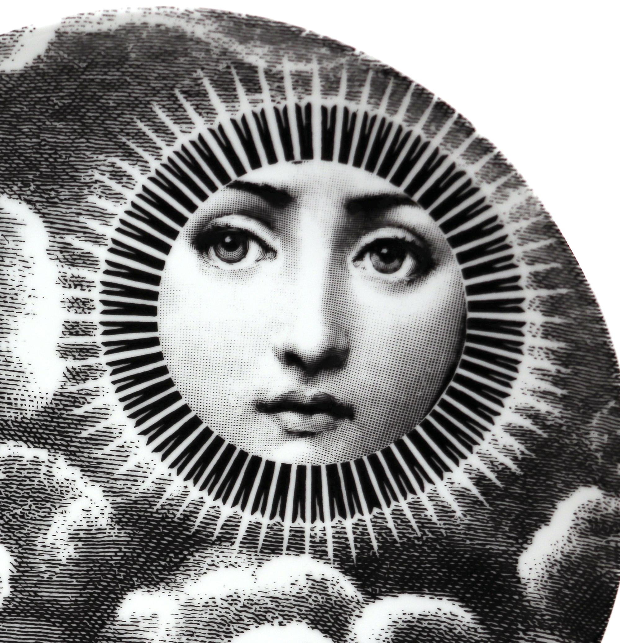 Vintage Fornasetti porcelain themes & variation plate #101,
The Sun,
Barnaba Fornasetti, Fornasetti Studio.

From a large collection of plates with different subjects-enquire for more information.

The Fornasetti porcelain plate in the Themes