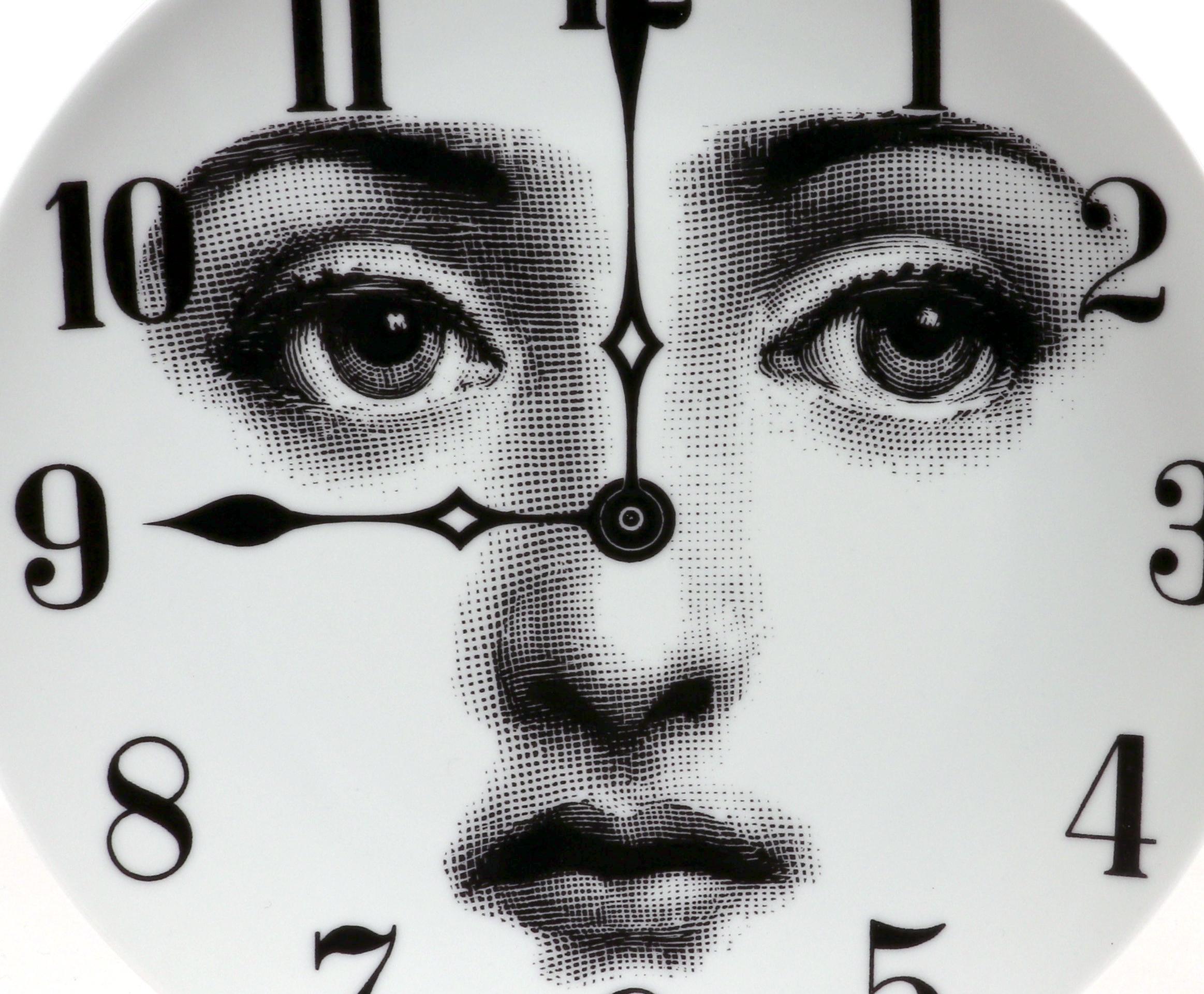 Vintage Fornasetti Porcelain Themes & Variation Plate #74
The Clock,
Atelier Fornasetti

The Surreal Fornasetti porcelain plate in the Themes & Variation pattern depicts the face of Lina Cavalieri, Piero Fornasetti's muse as a