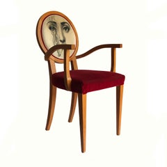 1970's Italian Armchair upholstered in Fornasetti print