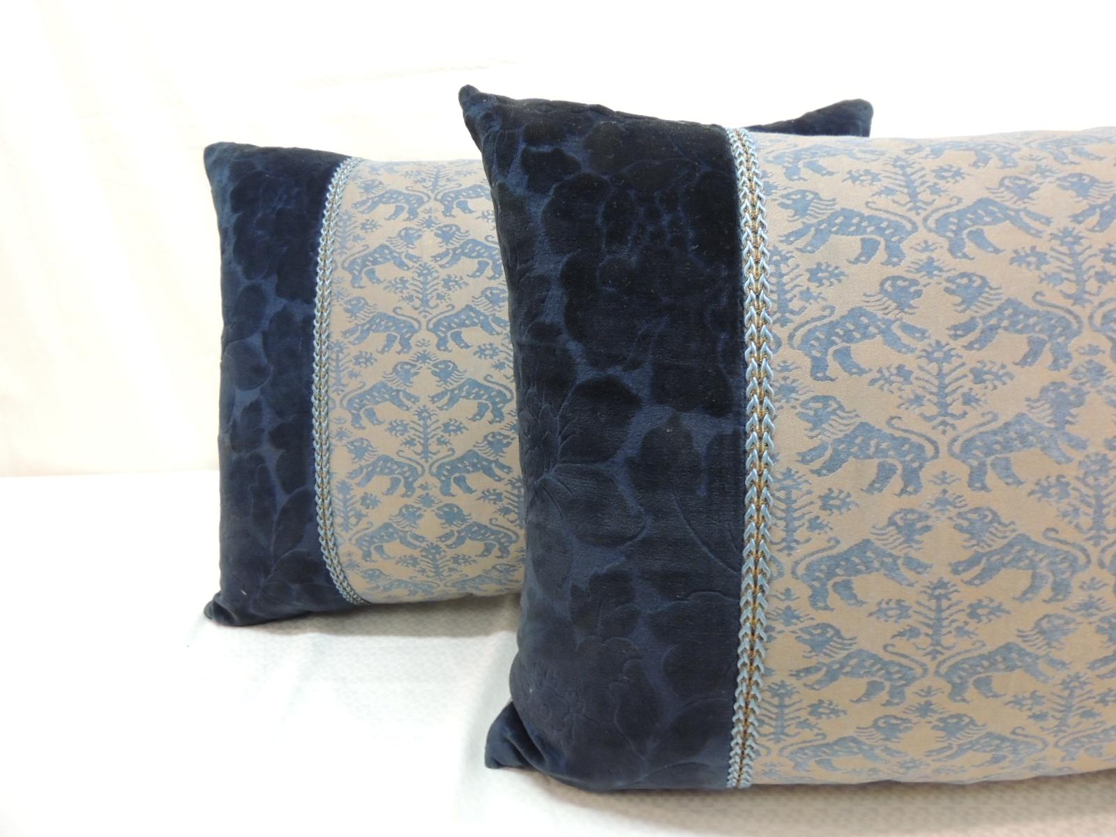 Vintage Fortuny “Richelieu” blue on silver decorative bolster pillow, framed with antique cotton floral velvet and embellished with antique silver metallic tape trim. Accentuated with silk rope trim. Golden silk backing.
Decorative pillow