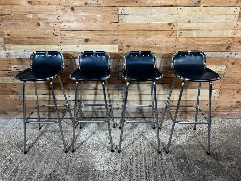 These are the rarest black leather stools by Charlotte Perriand.

Sought after four black leather Charlotte Perriand stools for Les Arcs, 1960.

four Charlotte Perriand stools from France, 

stunning stools very unusual and sought after, these were