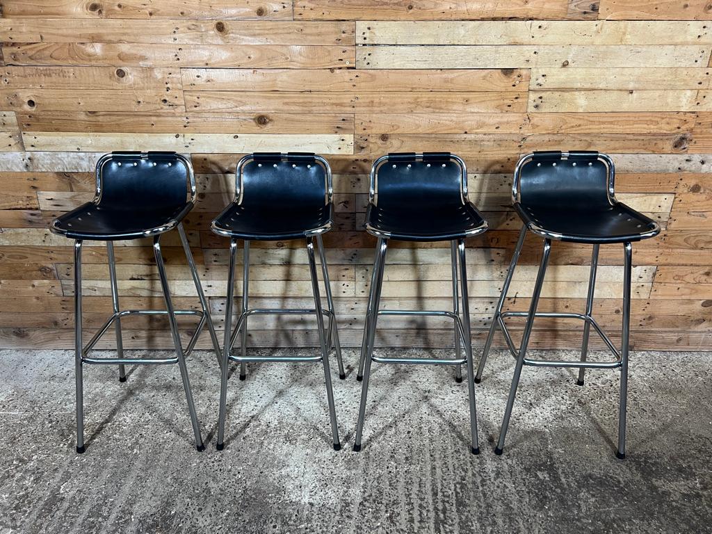 Mid-Century Modern Vintage Four Black Leather Stools Selected by Charlotte Perriand for Les Arcs For Sale