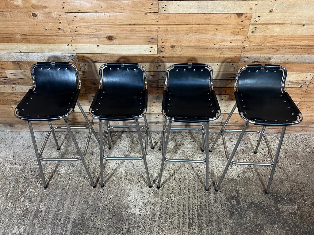French Vintage Four Black Leather Stools Selected by Charlotte Perriand for Les Arcs For Sale