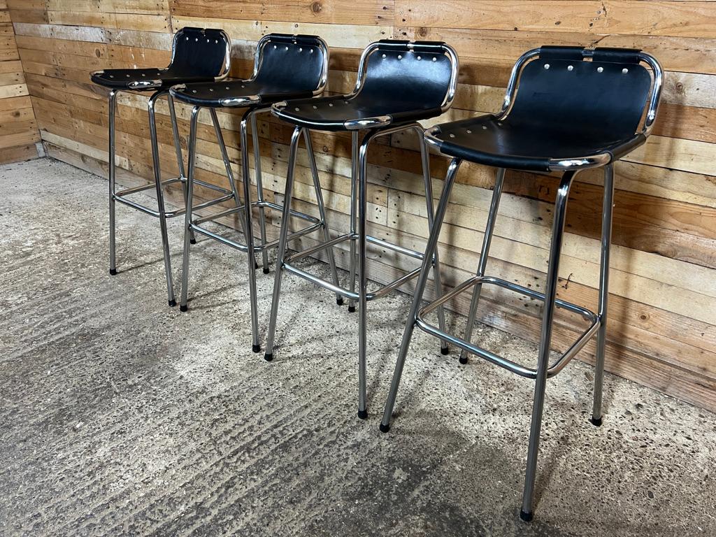 20th Century Vintage Four Black Leather Stools Selected by Charlotte Perriand for Les Arcs For Sale