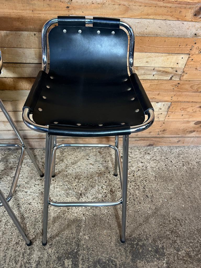 Metal Vintage Four Black Leather Stools Selected by Charlotte Perriand for Les Arcs For Sale