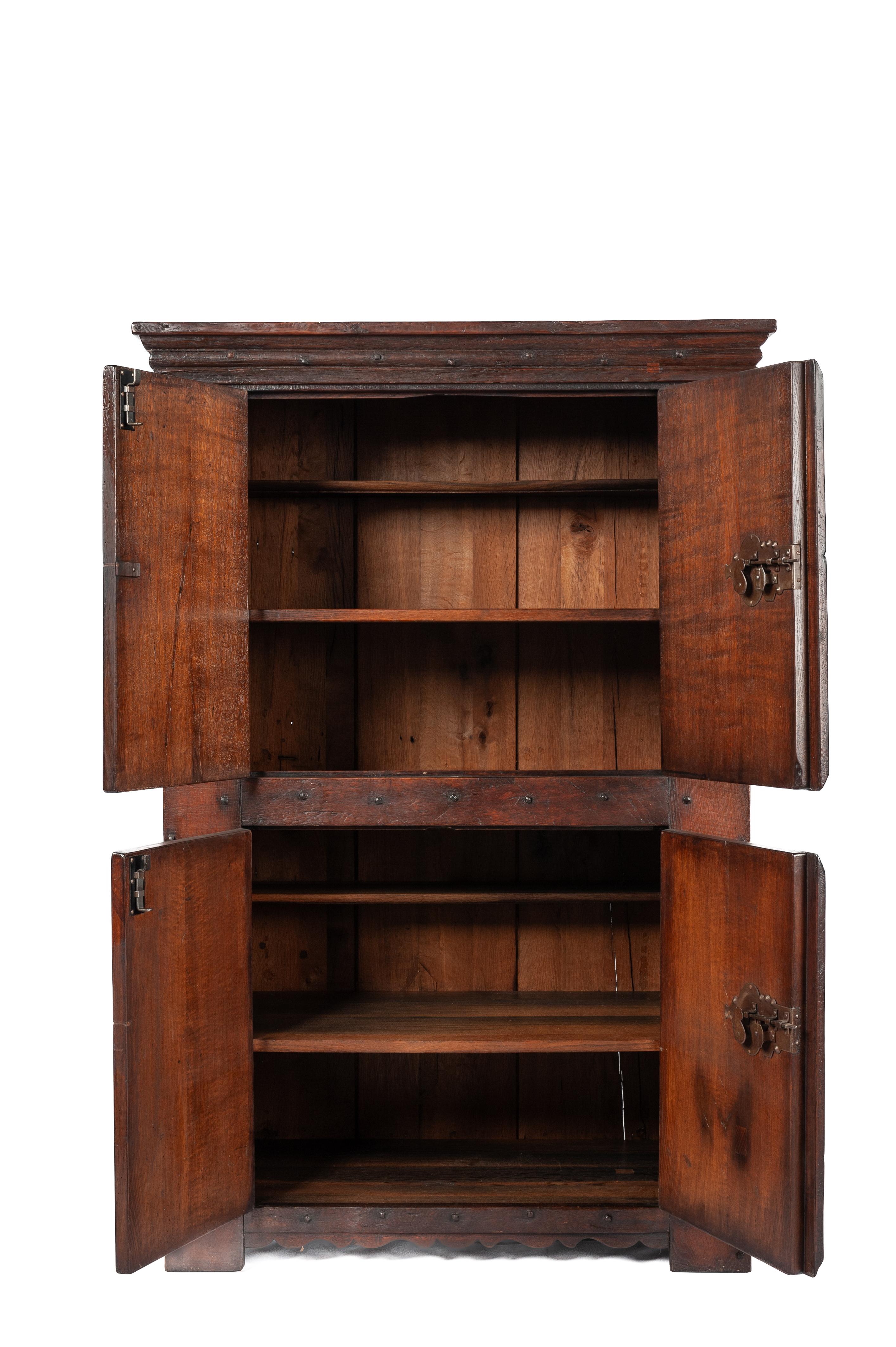 Forged Vintage Four-Door Oak warm brown cupboard by Piet Rombouts & Sons, 1960s For Sale
