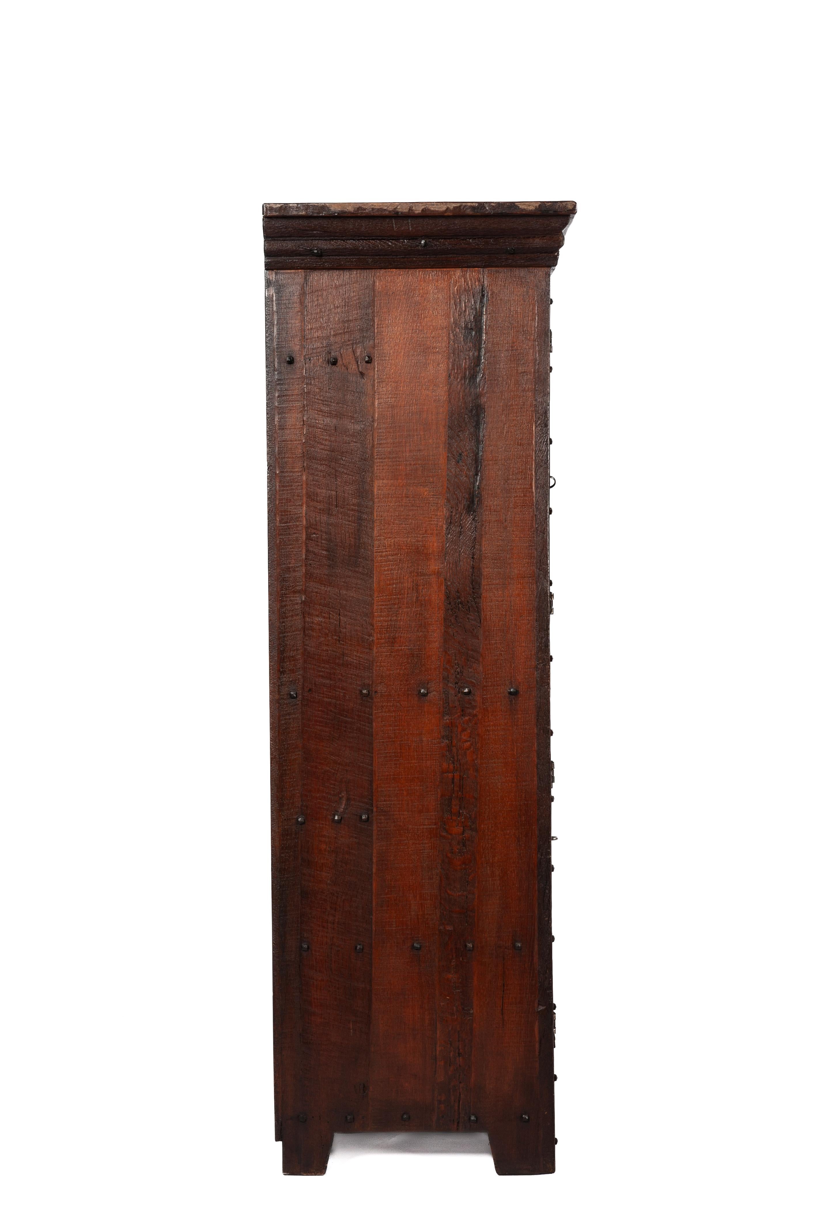 Vintage Four-Door Oak warm brown cupboard by Piet Rombouts & Sons, 1960s In Good Condition For Sale In Casteren, NL