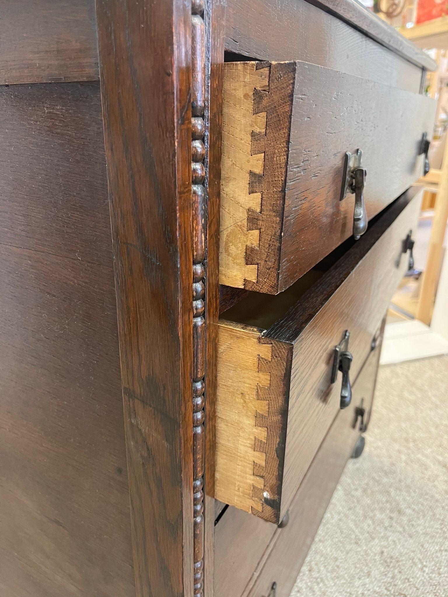 Vintage Four Drawer Dresser on Casters With Carved Wood Detailing. For Sale 2
