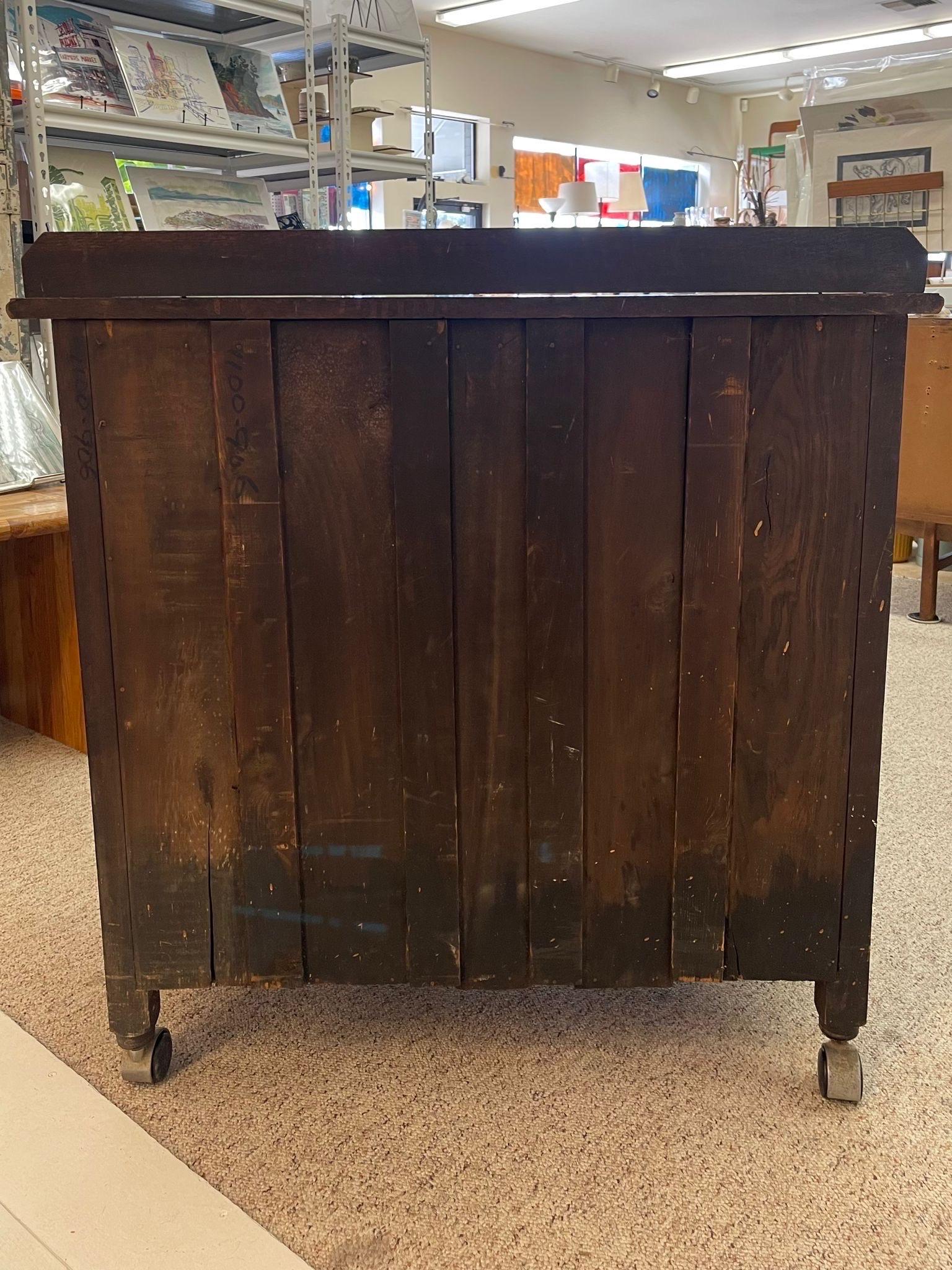 Vintage Four Drawer Dresser on Casters With Carved Wood Detailing. For Sale 3