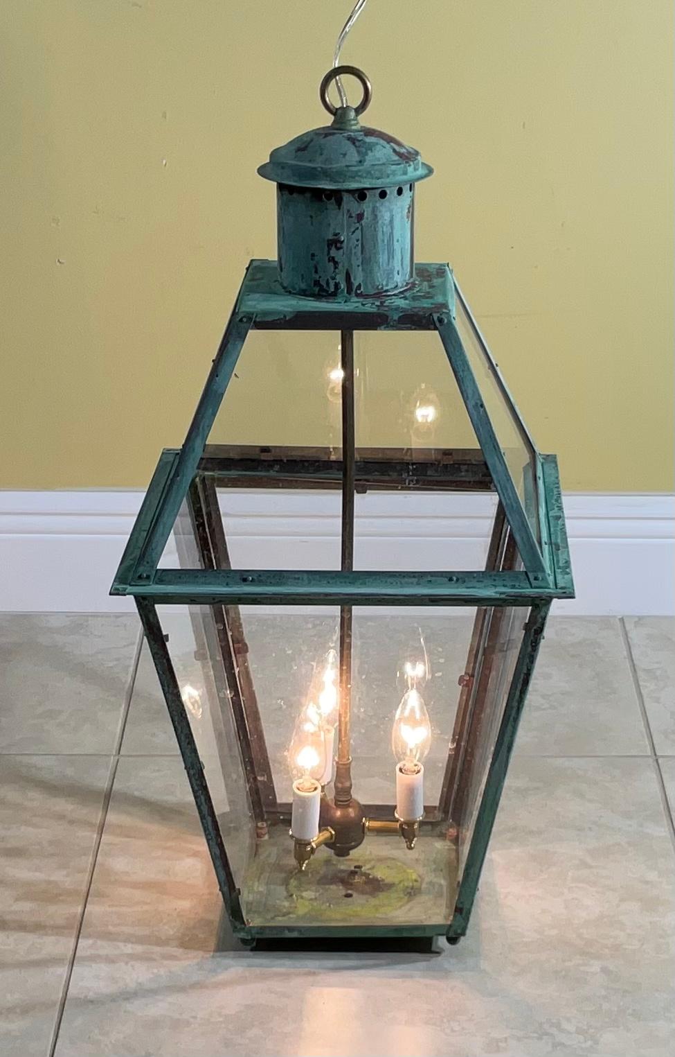 Vintage Quality handmade solid copper lantern with three 40/watt lights.
Electrified and ready to light. Beautiful oxidization patina.
Could be used in wet location and indoor.
Chain and canopy included.