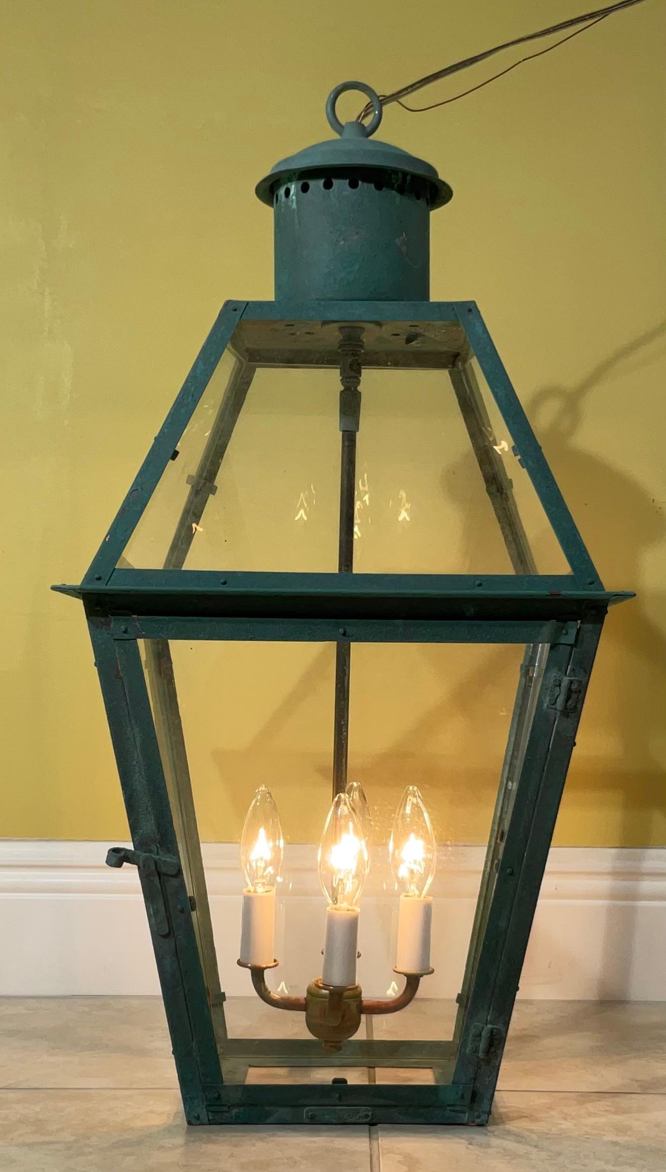 Vintage quality handmade solid copper lantern with four 40/watt watt lights.
Electrified and ready to light. Beautiful oxidization patina.
Could be used in wet location and indoor.
Chain and canopy included.