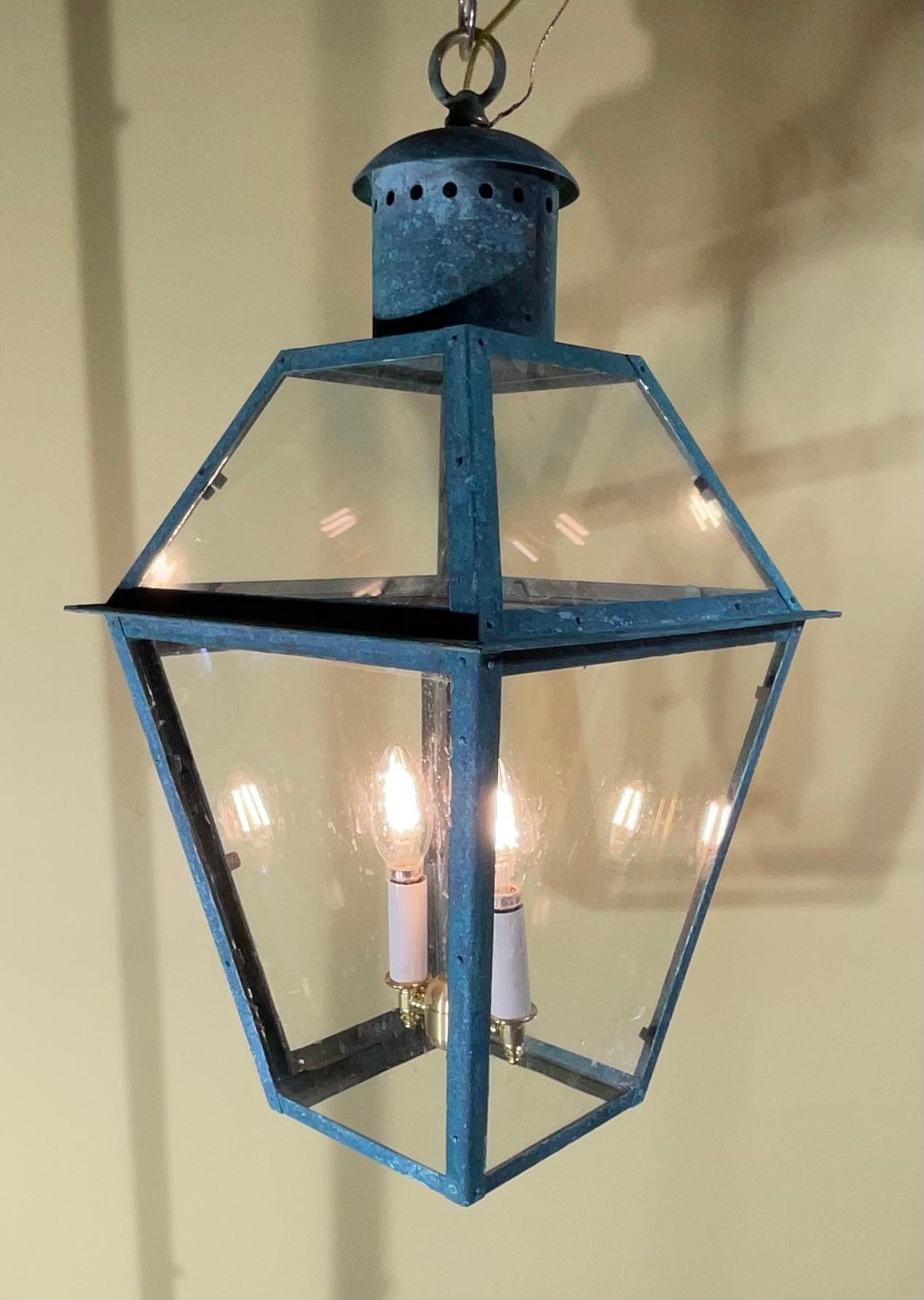 Vintage quality handmade solid copper lantern with two 60 watt lights.
Electrified and ready to light. Beautiful oxidization patina.
Could be used in wet location and indoor.
Chain and canopy included.