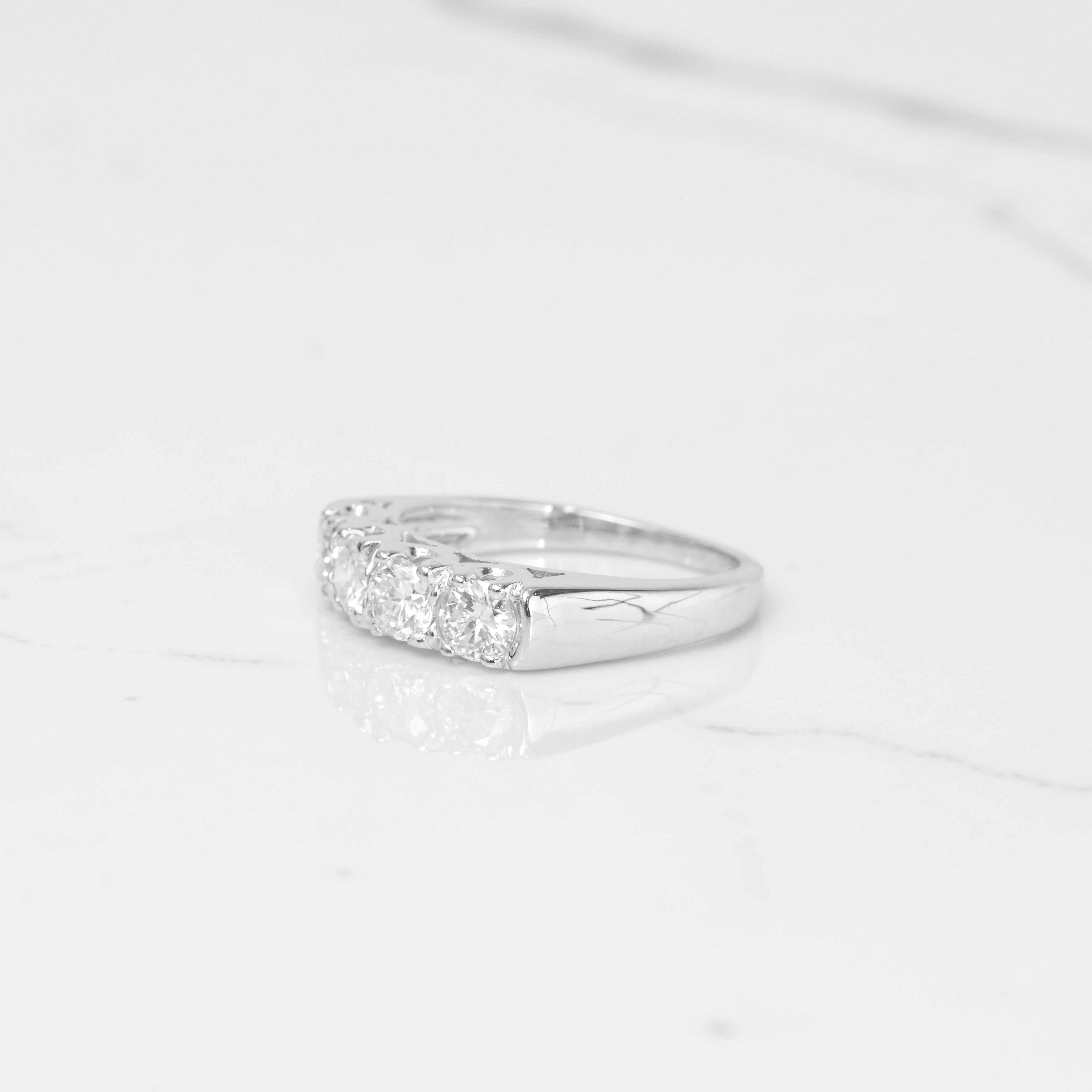 This gorgeous diamond anniversary band is part of our reclaimed vintage collection. Restored like new, this band consists of 1 carat of beautiful high quality diamonds! Beautifully set in 14k white gold. Ring size is a 6.
Additional sizes available