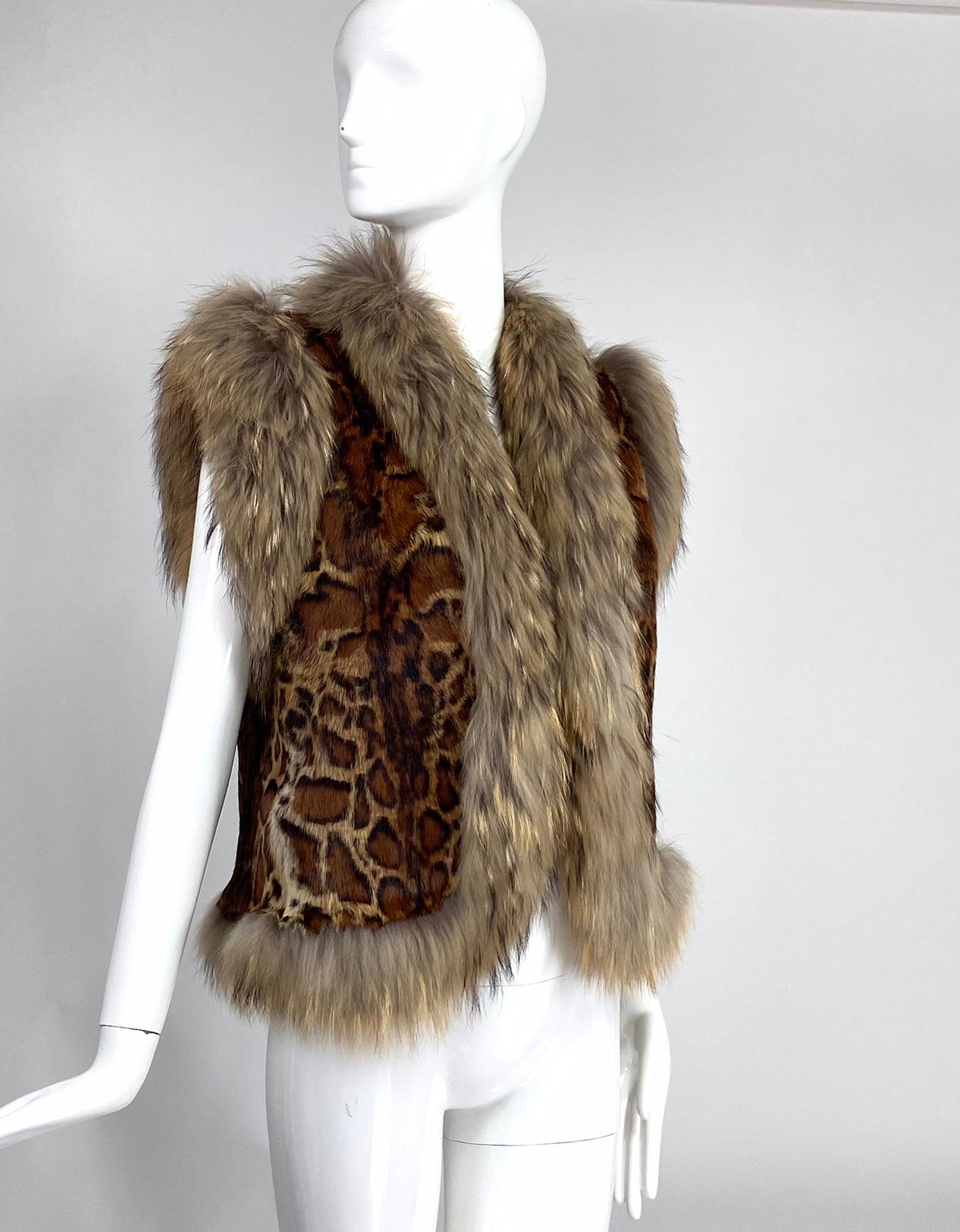 Vintage fox fur & stenciled faux ocelot fury gilet from the 1970s and purchased in France. Open front vest is trimmed at the facings with light soft fox fur, the body of the gilet is soft stenciled fur done to look like ocelot or similar. Fully