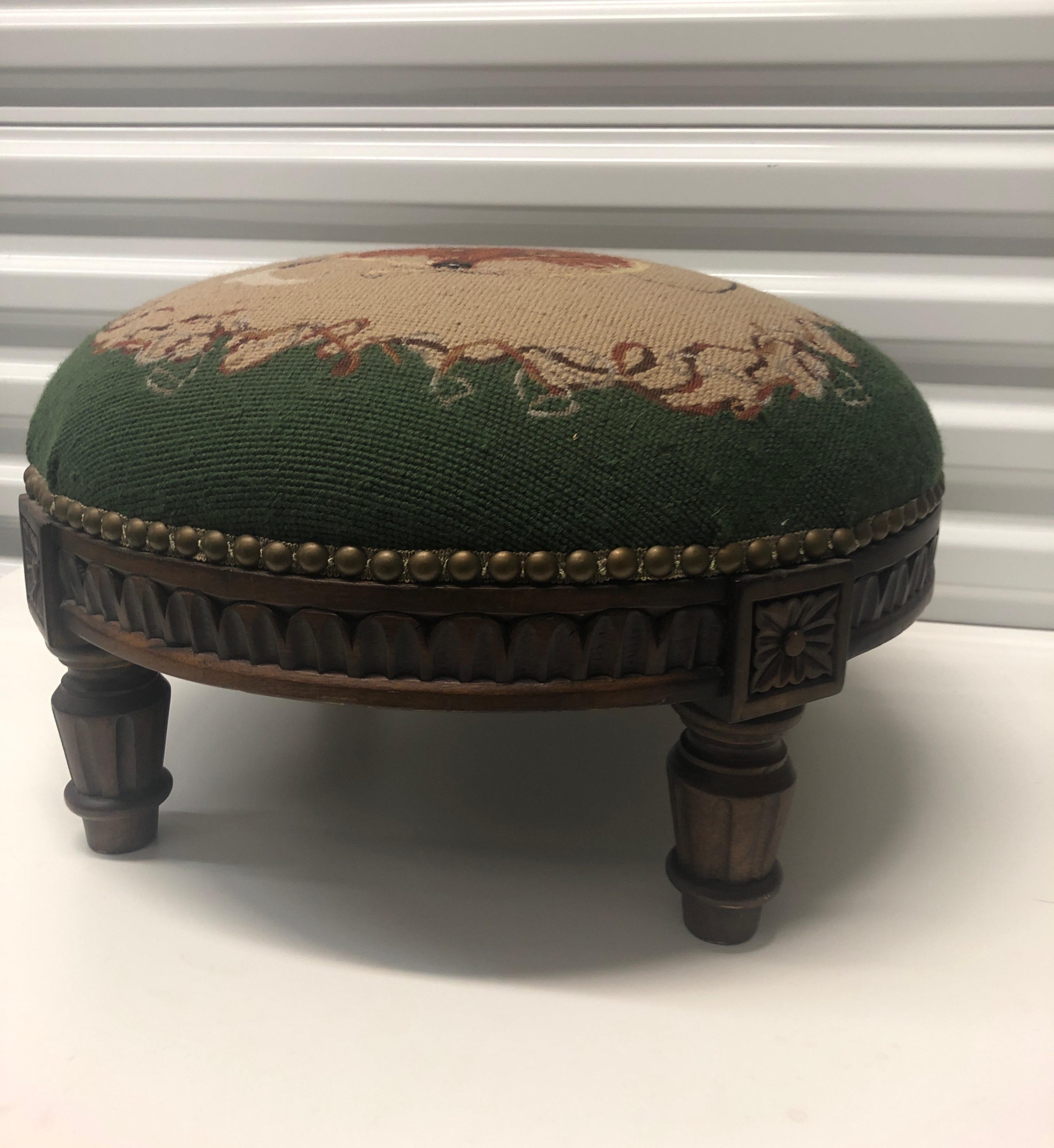 Vintage round fox hunting scene tapestry footstool
Short Louis XVI style legs and nailheads trim.
Size: 18” D x 10” H.