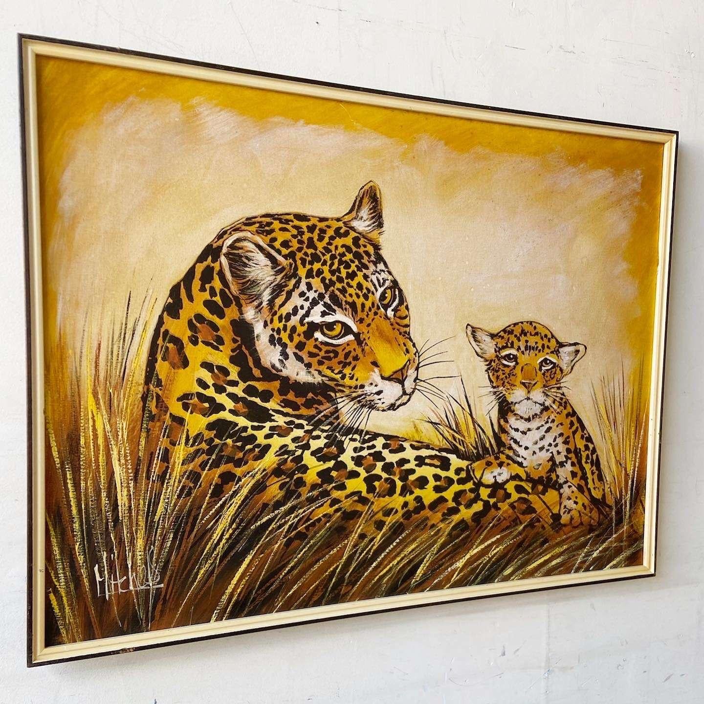 Exceptional large framed and signed oil painting on canvas. Subject is a mother a child cheetah sitting in the grasses.