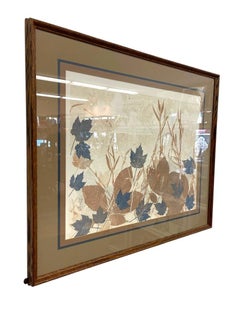 Vintage Framed Botanical Leaf Artwork with Blue and Brown Foliage Motif.