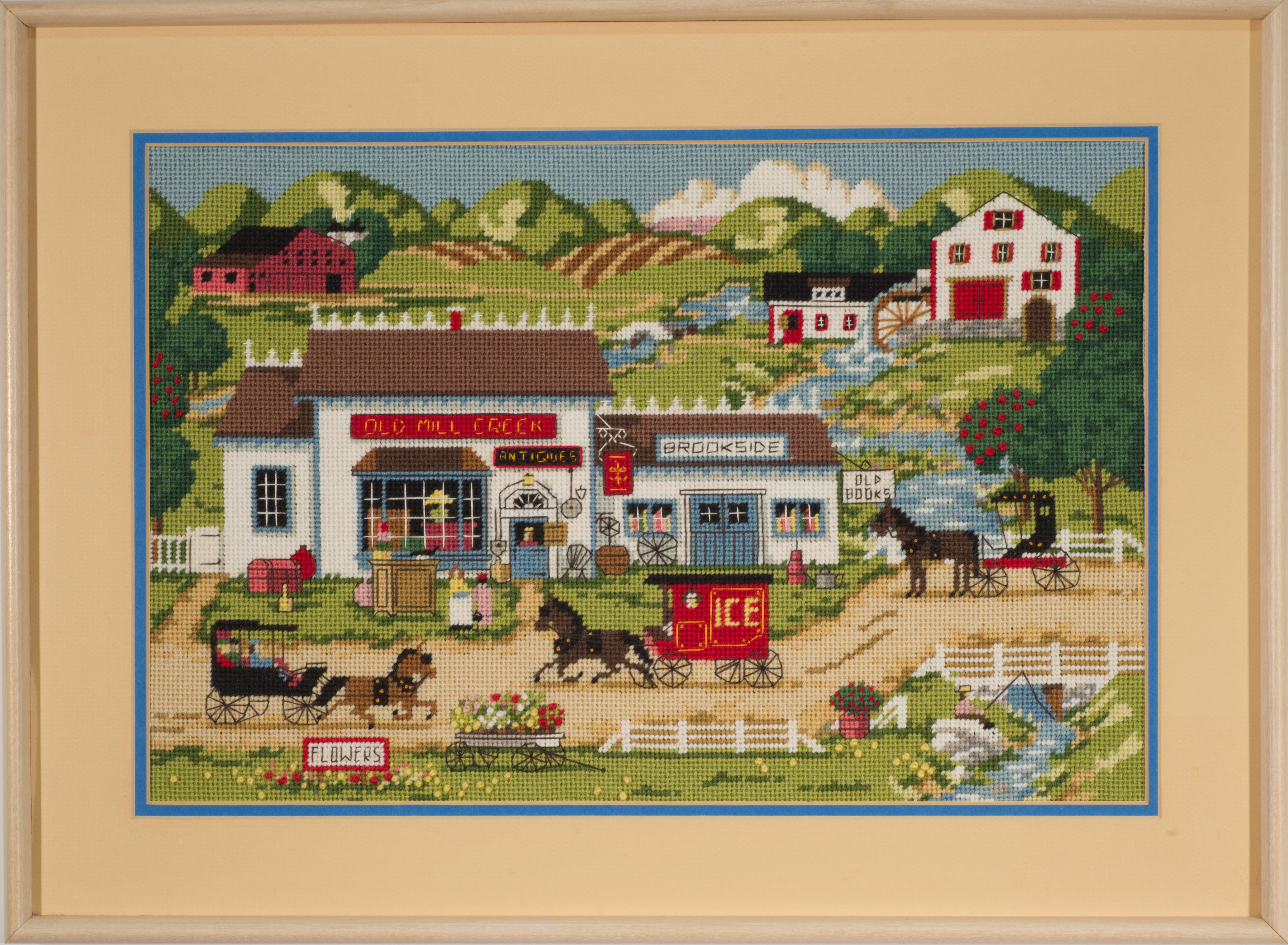 Vintage original Folk Art landscape features a rural scene with people in horse-driven carriages arriving to and passing by the small stores, including bookstore and antiques store, and flower stand displays in the forefront, and a few residential