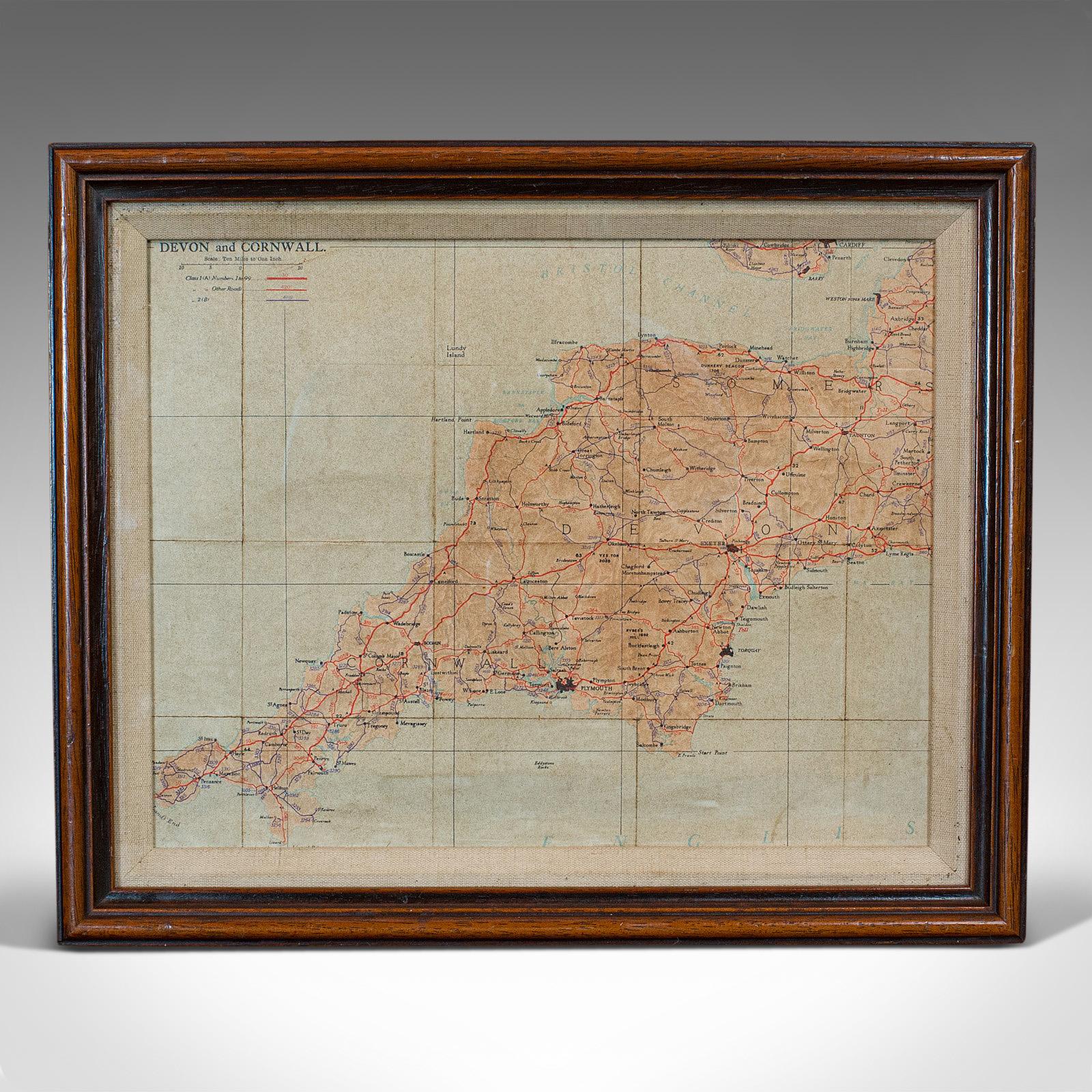 This is a vintage framed map. An English, mahogany illustrated map of Devon and Cornwall, dating to the mid-20th century.

A fascinating example of cartography
Displays a desirable aged patina
Mahogany frame with tiered bevel
Rear complete with