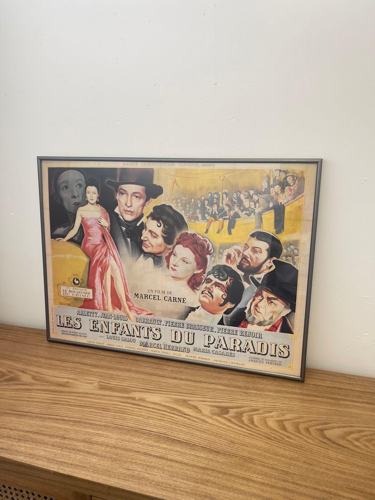 This framed movie poster is of a French Film from 1945. Translates “ The children of paradise “ Within Silver toned. Professionally custom framing. Vintage Condition Consistent with Age as Pictured.

Dimensions. 26 1/2 W ; 1/2 D ; 19 H