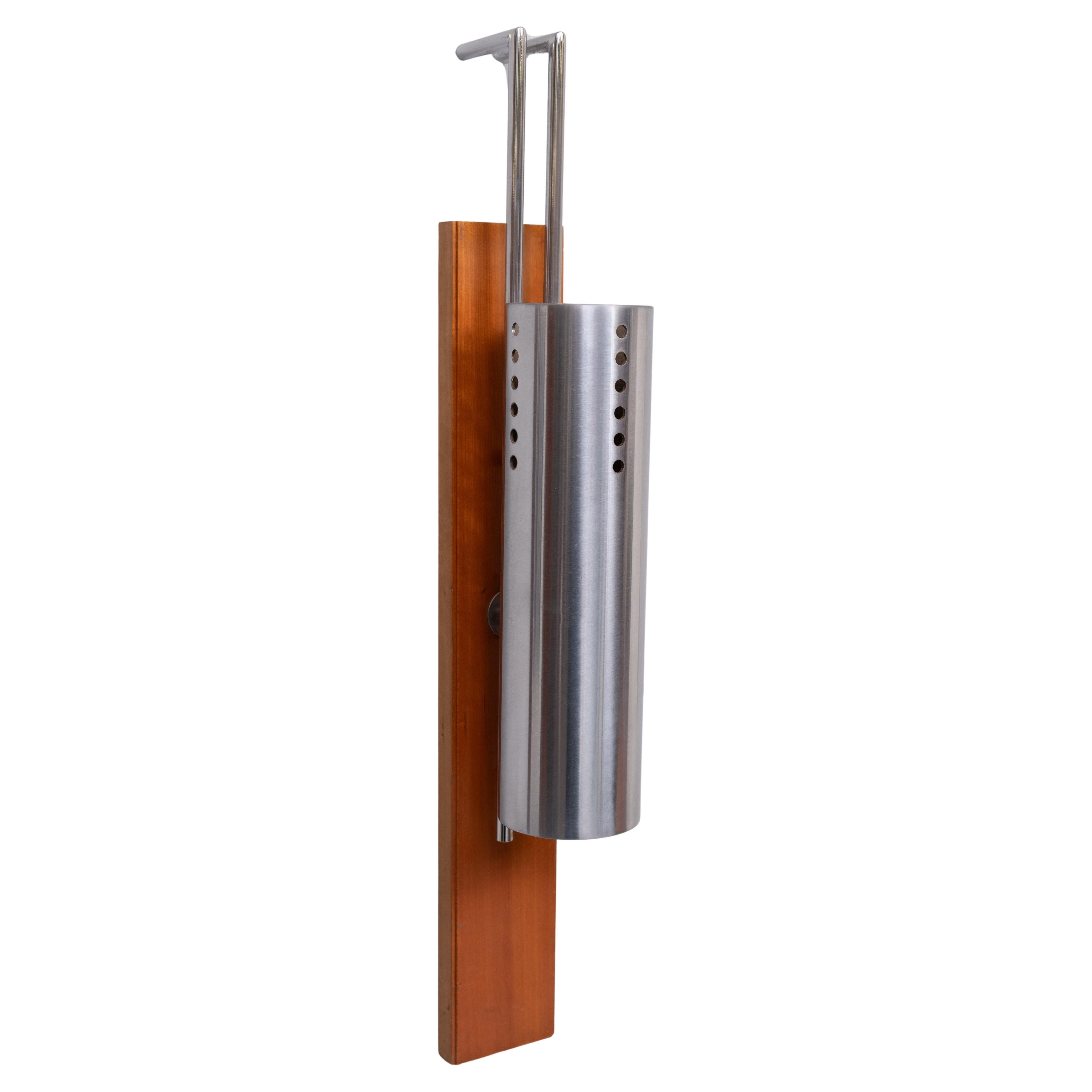 Beautiful set of Wall lamps .Polish stainless steel tube ,mounted
on a solid Nutwood base . Very nice quality lamps .1970s France .  