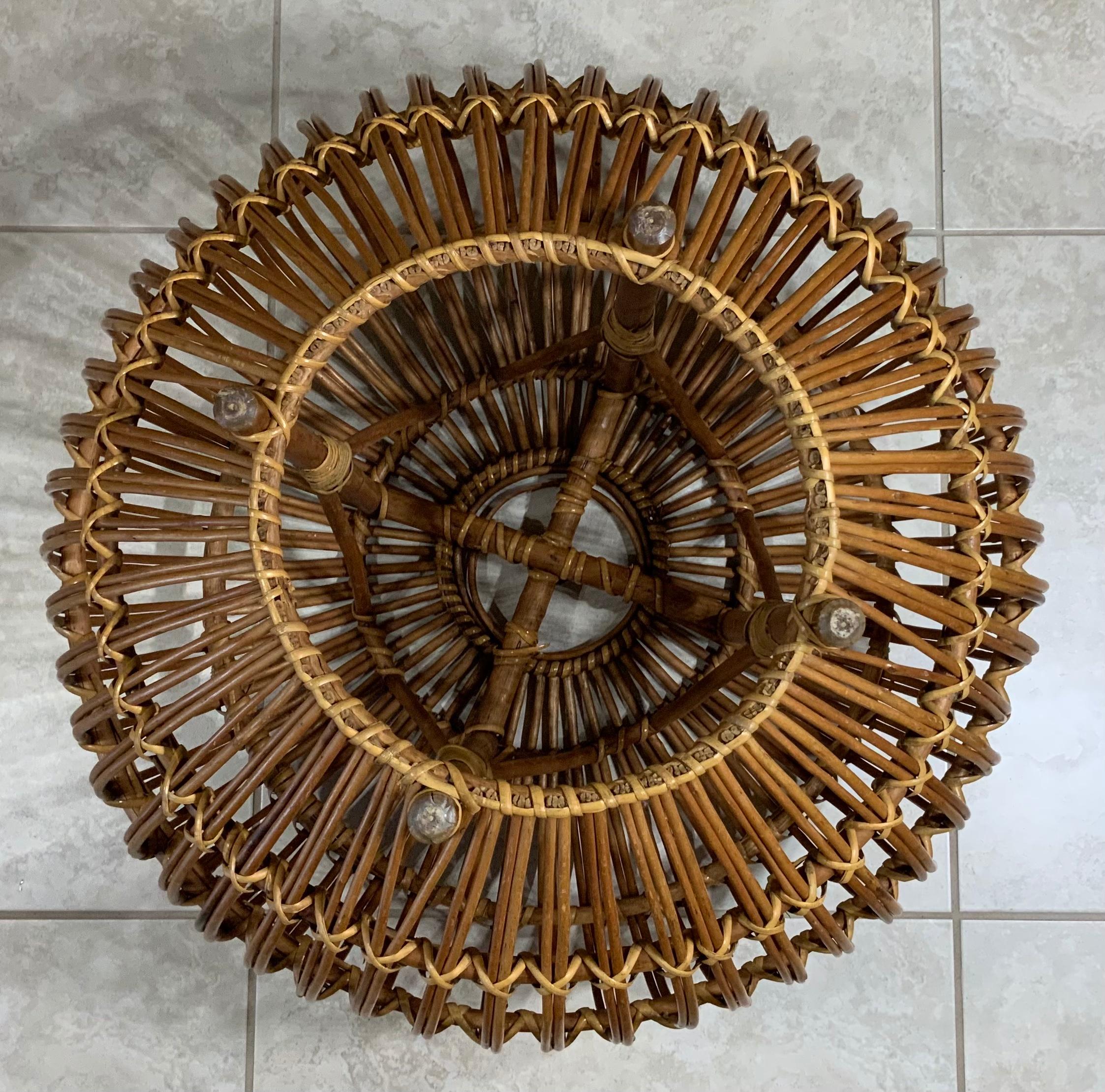 Vintage woven rattan ottoman in the style of Franco Albini, Age-appropriate wear to the woven rattan, very Sound construction woven ties are tightly bound circular.
Used as stool with or without pillow , or side table .
Glass top or pillow are not