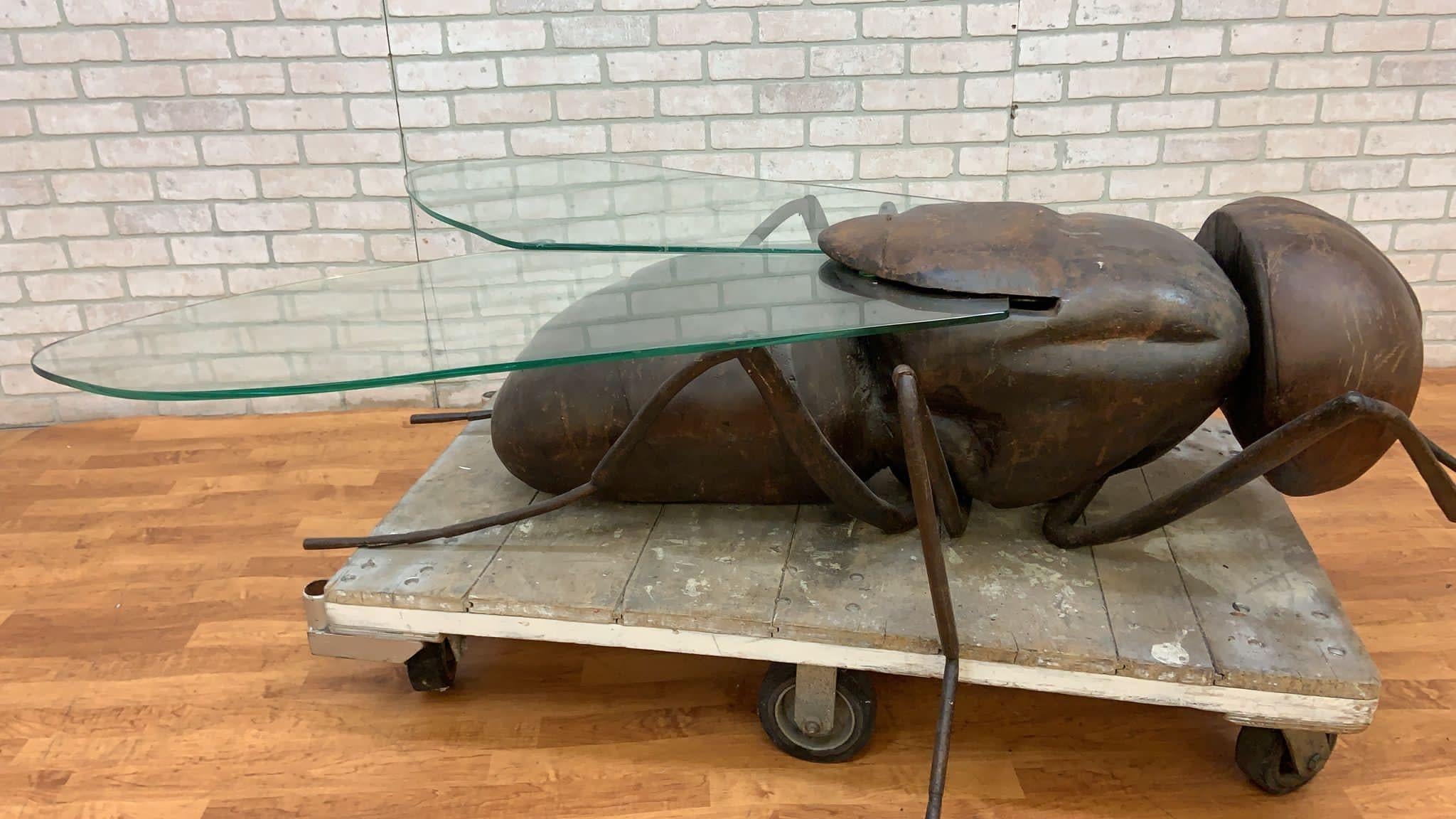 Vintage Francois Melin Stag Style Iron and Glass Wing Fly Coffee Table

The Vintage Francois Melin Stag Style Iron and Glass Wing Fly Coffee Table is a remarkable piece of furniture and art. Crafted in the style of the renowned French sculptor and