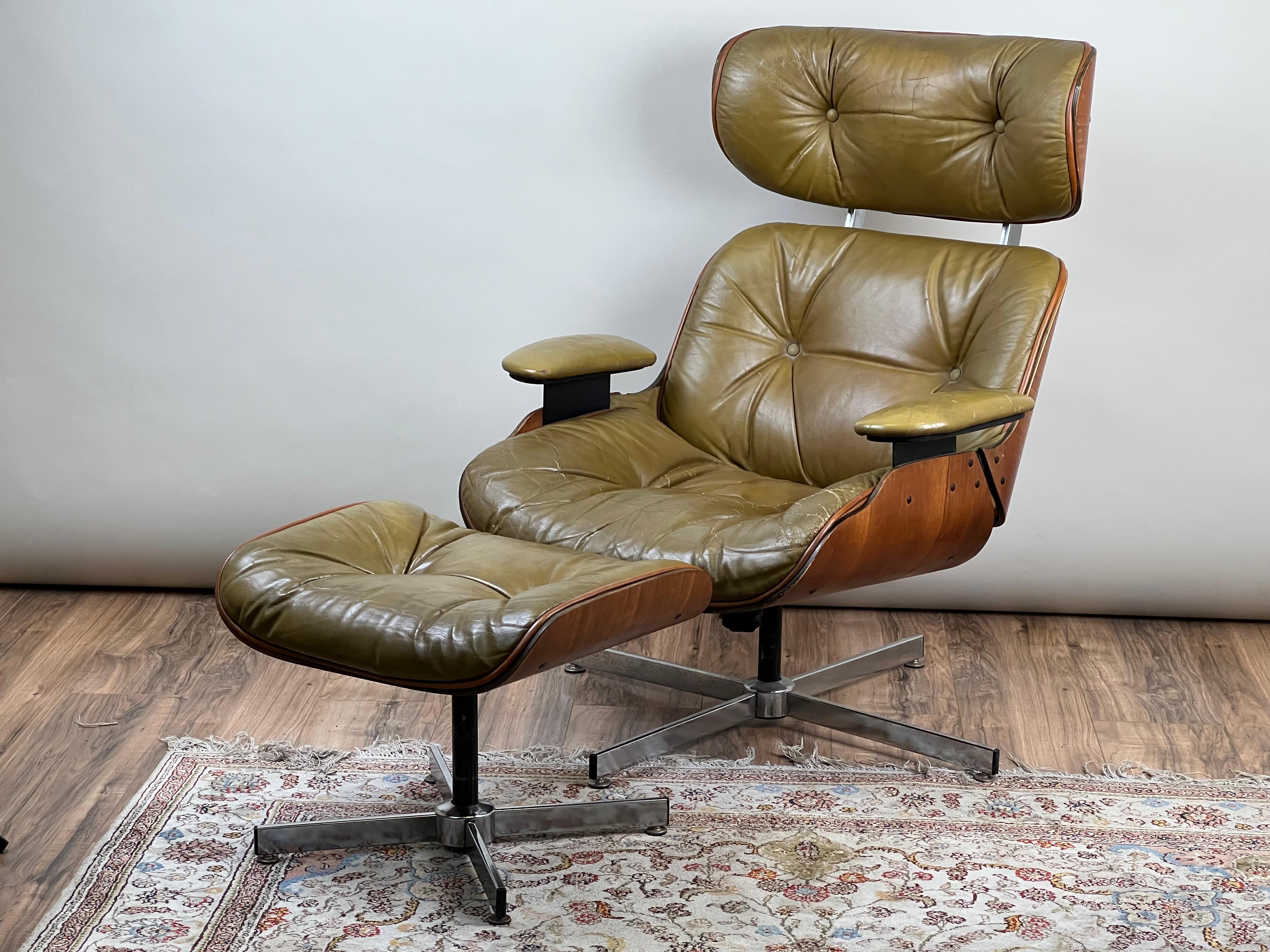This vintage mid-century modern lounge chair and ottoman, designed by Frank Doerner for Selig, embodies the iconic Eames style with its sleek walnut veneer shell, tufted leather upholstery, and sculptural metal base. The ergonomically contoured