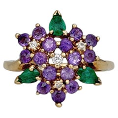 Anello cocktail d'epoca Franklin MInt in oro 18 carati con ametista e smeraldo e fiore viola