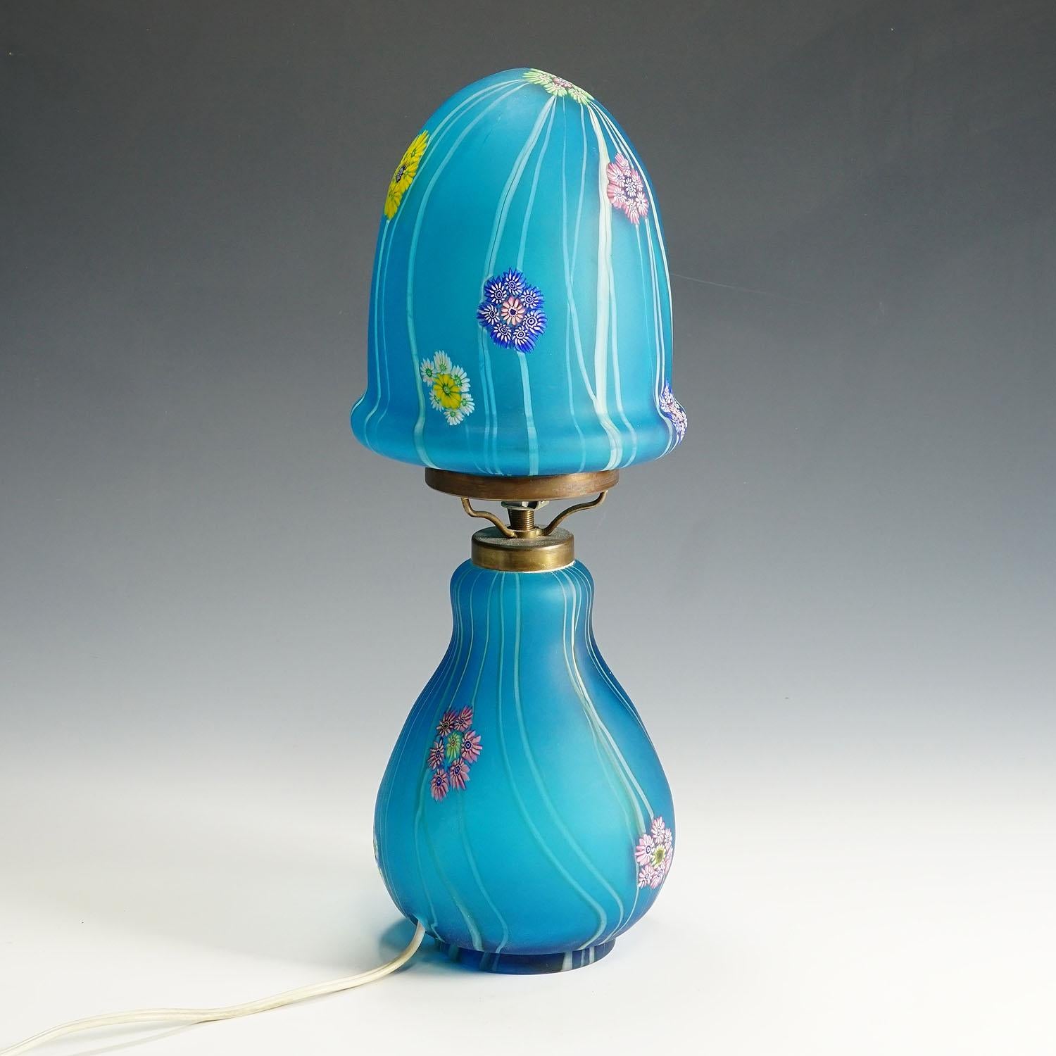 Vintage Fratelli Toso Millefiori Desk Lamp, Murano circa 1950

A rare millefiori murrine glass desk lamp manufactured by Vetreria Fratelli Toso, Murano around 1950. Made of blue glass with melted white and green glass threads and polycrome murrines.