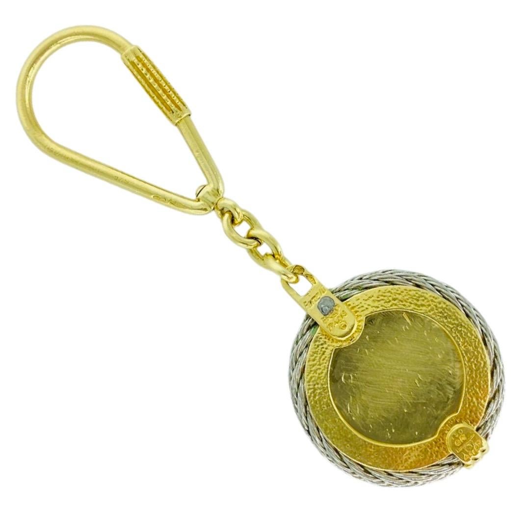 Vintage Fred Paris Force 10 Jaguar Key Chain 18k Gold & swirl steel.
30.4 grams
Diameter 32.75mm