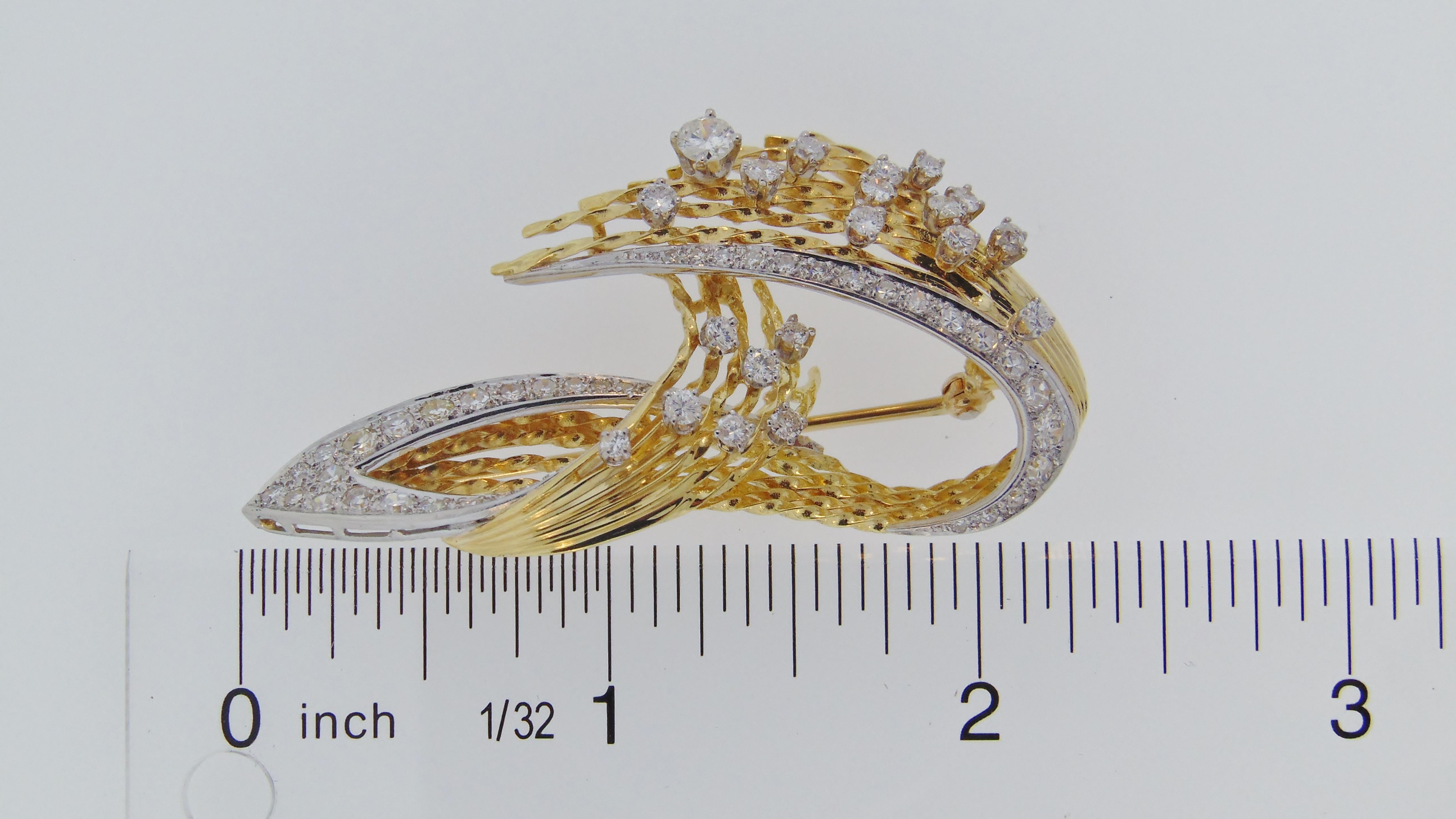 Des in France, Platinum and 18 karat yellow gold, beautifully hand crafted with approximately 1.75 carats total weight of Diamonds.