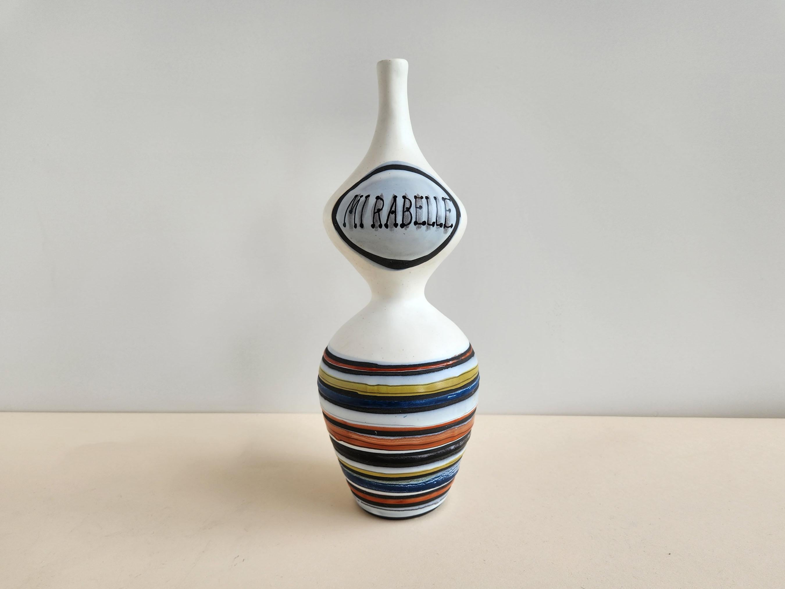 Vintage ceramic Mirabelle flask by Roger Capron - Vallauris, France

Roger Capron was in influential French ceramicist, known for his tiled tables and his use of recurring motifs such as stylized branches and geometrical suns.   He was born in