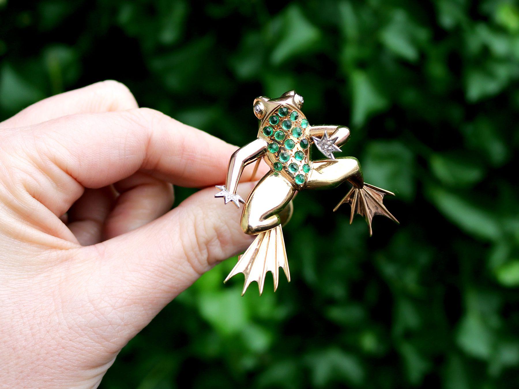 A stunning, fine and impressive vintage French 0.75 carat emerald and 0.11 carat diamond, 18 karat yellow gold and platinum set 'frog' brooch; part of our diverse vintage jewellery and estate jewelry collections

This stunning, fine and impressive