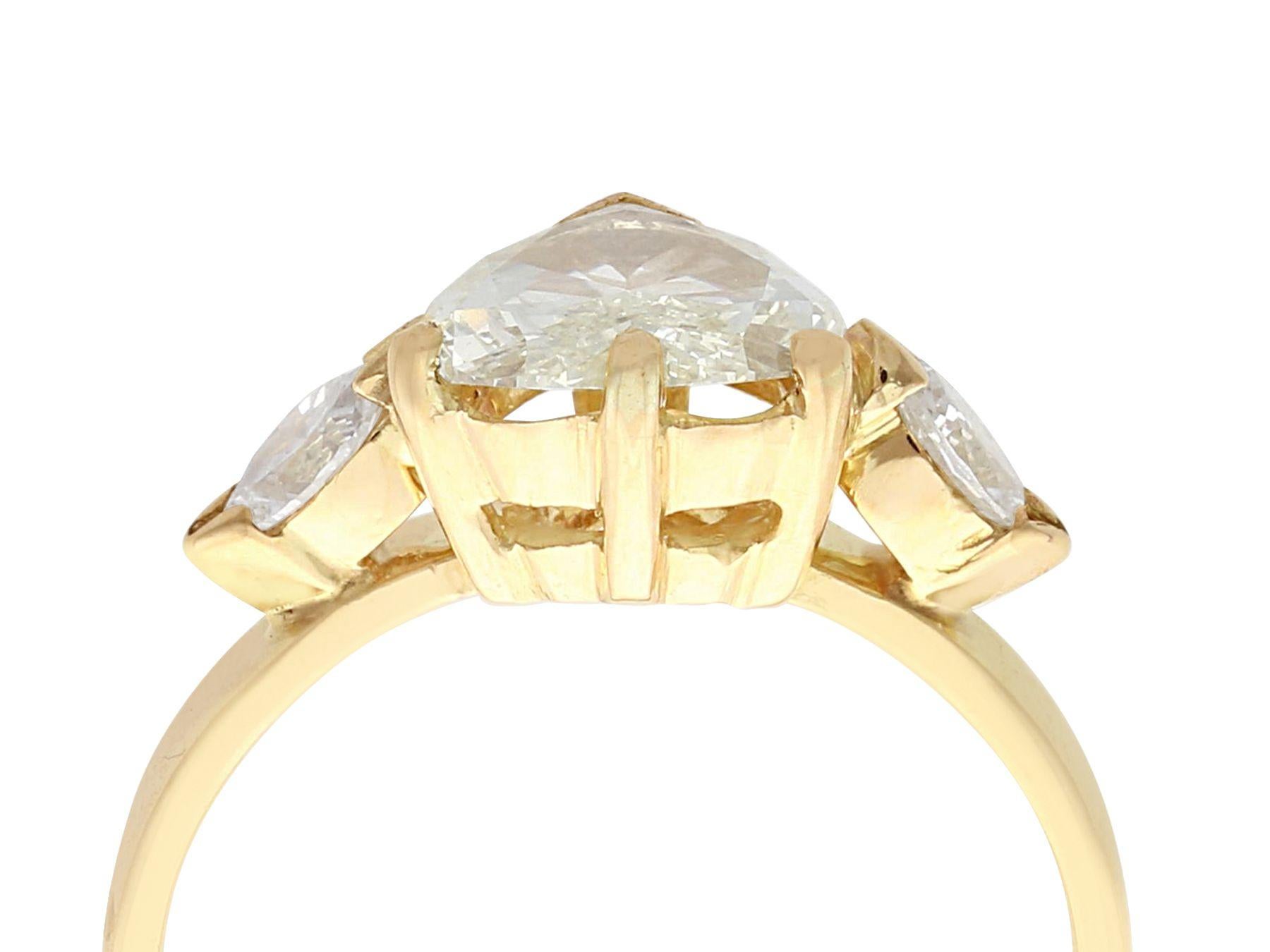 An impressive vintage 1990s French 1.32 carat diamond and 18 karat yellow gold engagement ring; part of our diverse gemstone jewelry and estate jewelry collections.

This fine and impressive vintage heart cut diamond ring has been crafted in 18k