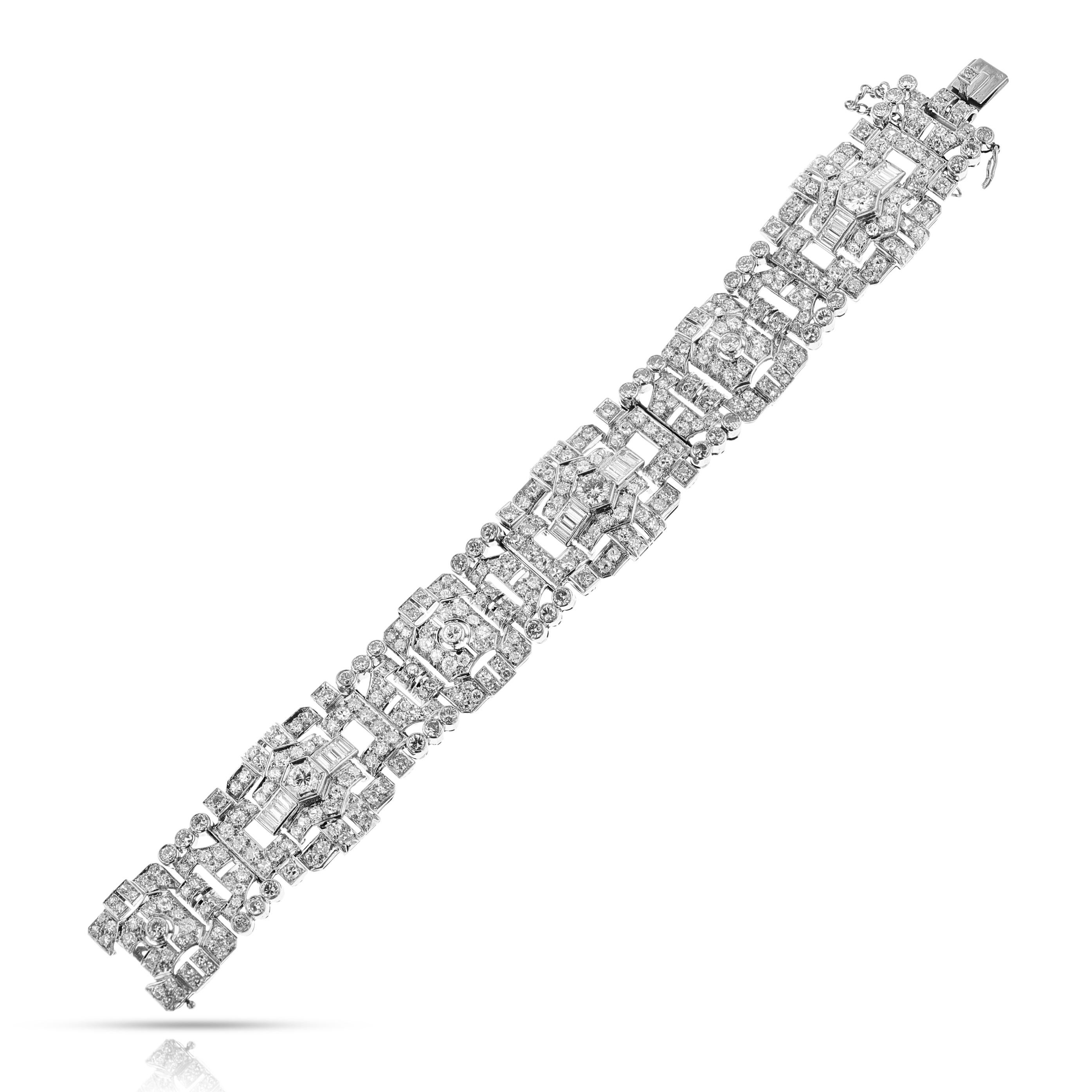 A Vintage French Diamond Bracelet made in Platinum. The diamonds weigh appx. 17.50 carats. There are a total of 306 diamonds. The color is F-H, and clarity is VVS1-SI1. The total weight of the bracelet is 64.84 grams. The length is 7.5 inches and