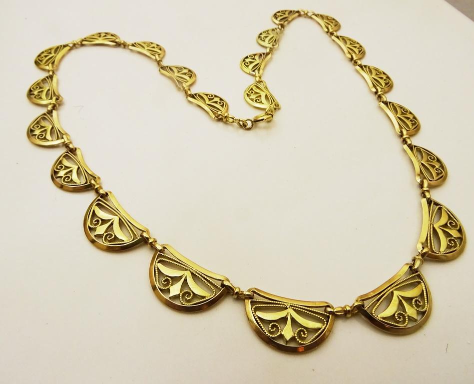A Superior example of A French 18 karat Gold ( Fully hallmarked as well as Acid Tested.) Crescent or Horse Shoe Necklace.
This Unique style of necklace is always different every Jeweler who made it put his own personal touch in it and there are no