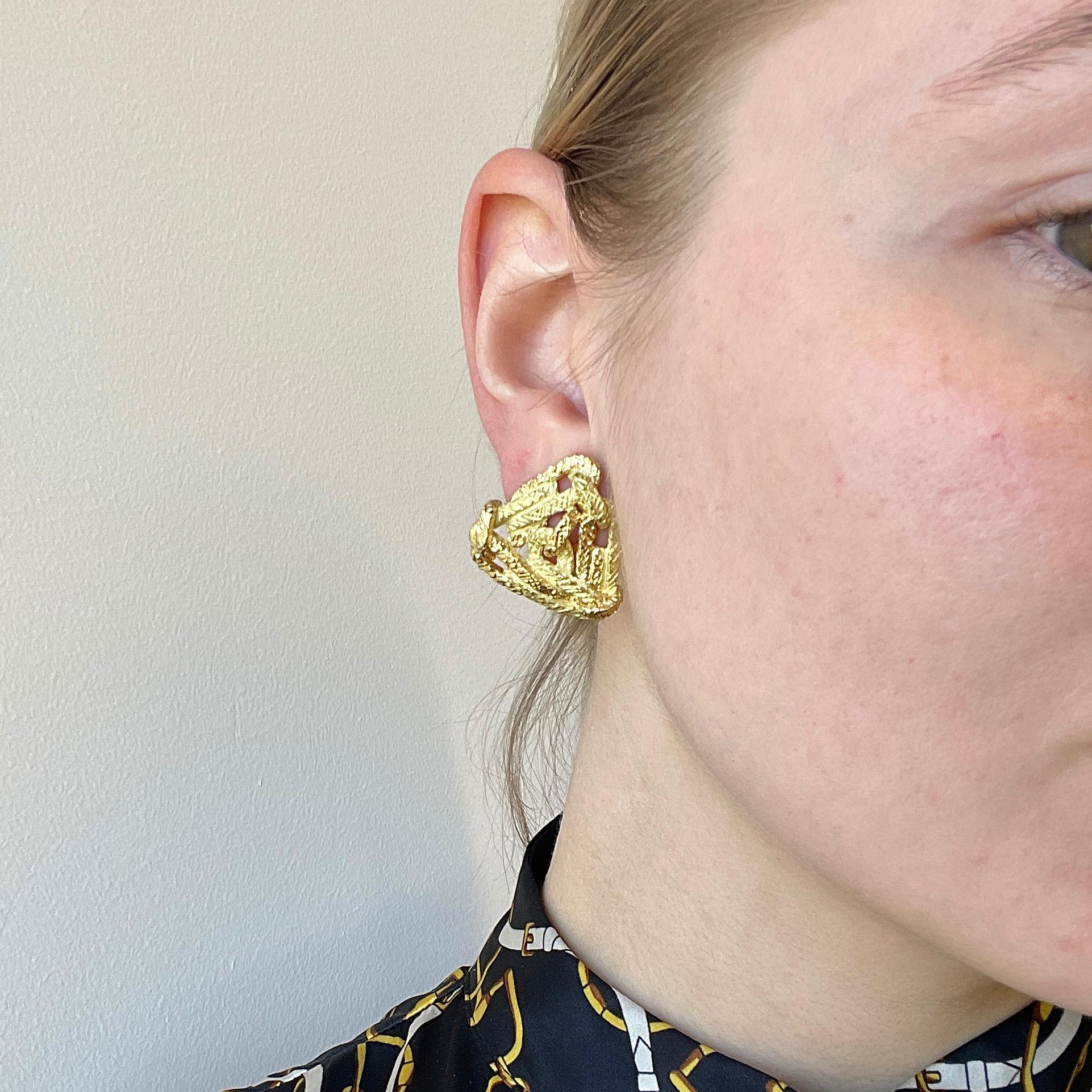 You can wear these earrings with an all-black outfit for a dramatic accent or with neutral tones to complete your look. Substantial, bold solid gold earrings are the hottest trend of this year. . The chunky solid gold earrings will visually make