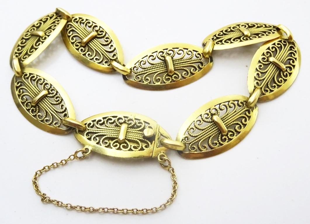 One of the finer examples of French Filigree work.
This type of work started in the art deco period and since then has been widely made in bracelets and necklaces in France and in French North Africa.
Made in fully hallmarked as well as acid tested