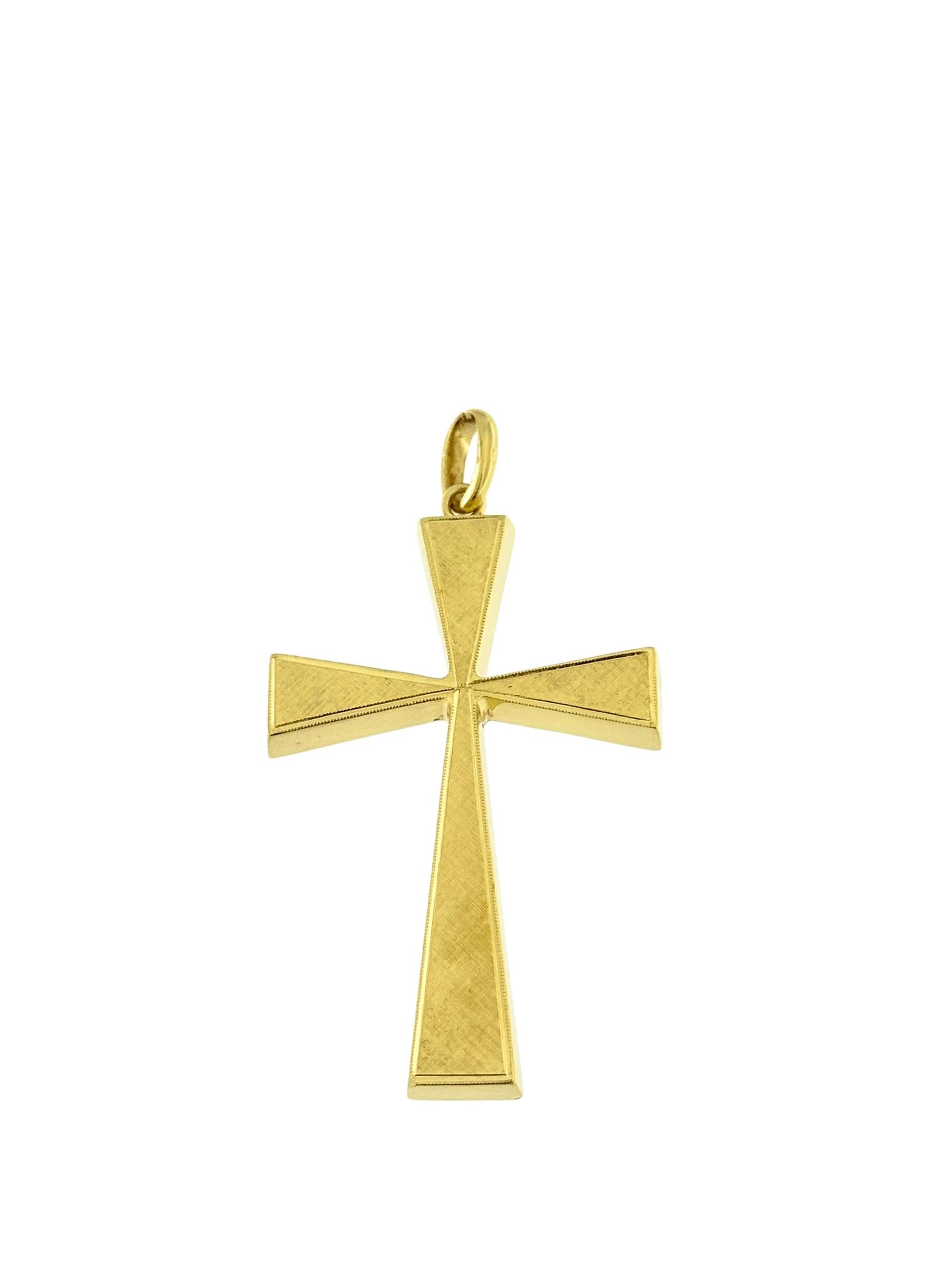 This Vintage French 18kt Yellow Gold Cross is a striking and symbolic piece, crafted with a satin finish that enhances its rich, warm glow. Designed in the style of a Templar cross, the pendant features distinctive eight-cornered ends, evoking the