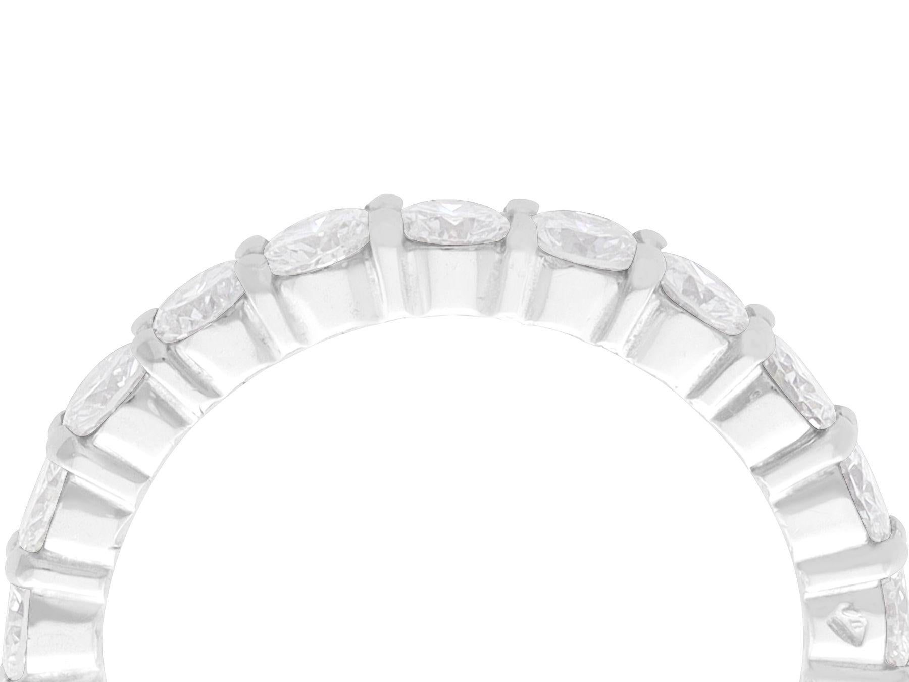 A fine and impressive vintage 1950s 1.89 carat diamond and 18 karat white gold full eternity ring; part of our diverse diamond jewelry and estate jewelry collections

This fine and impressive diamond eternity ring has been crafted in 18k white