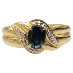 Vintage French 18k gold ring with sapphire and diamonds.