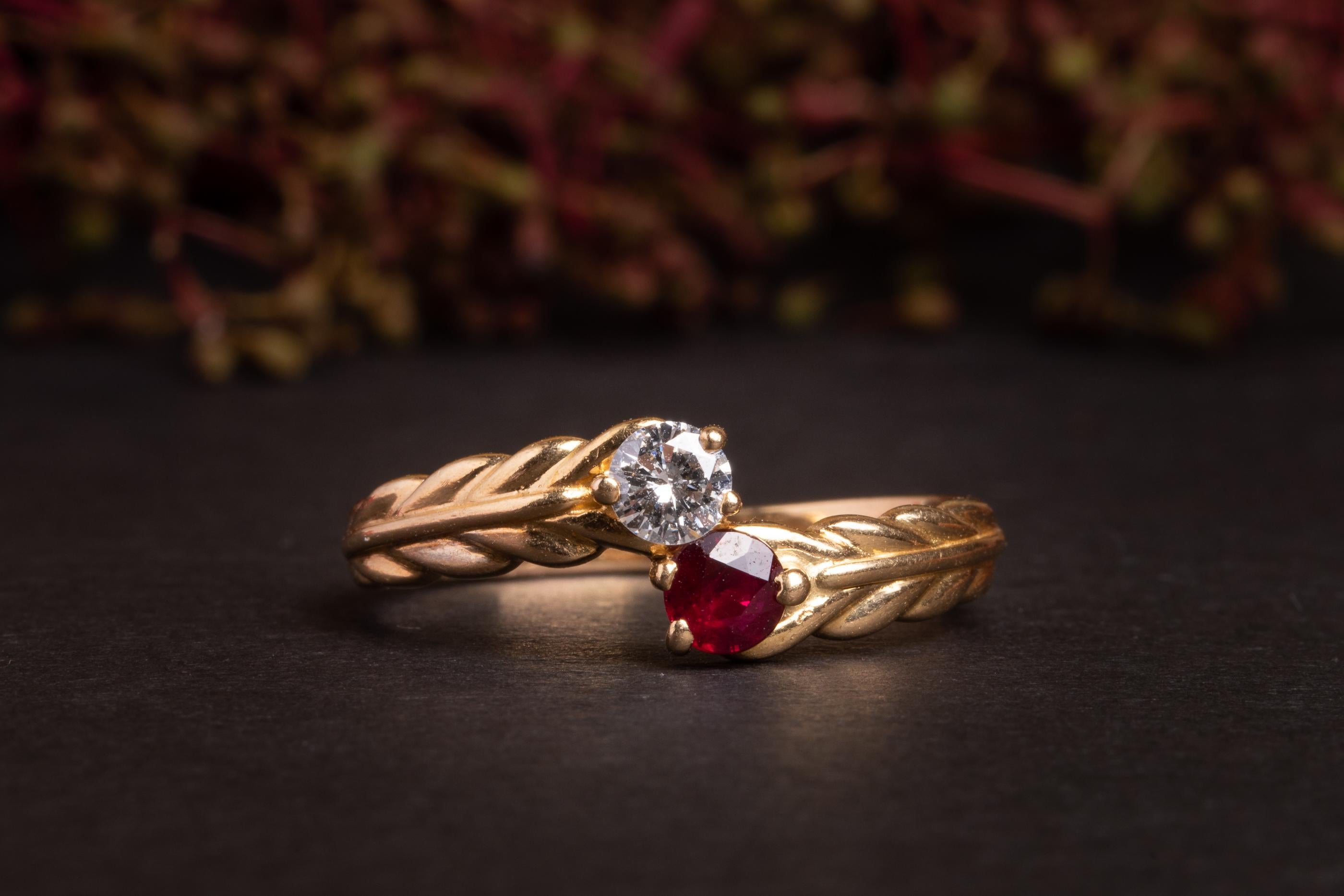 Such a lovely vintage ruby and diamond ring. This cute vintage ring is made of solid 18ct yellow gold and is set with a ruby and a diamond.
The diamond is very clear H/SI1 and weights circa 0.25 CT. The ruby is a natural untreated stone of circa 0.2