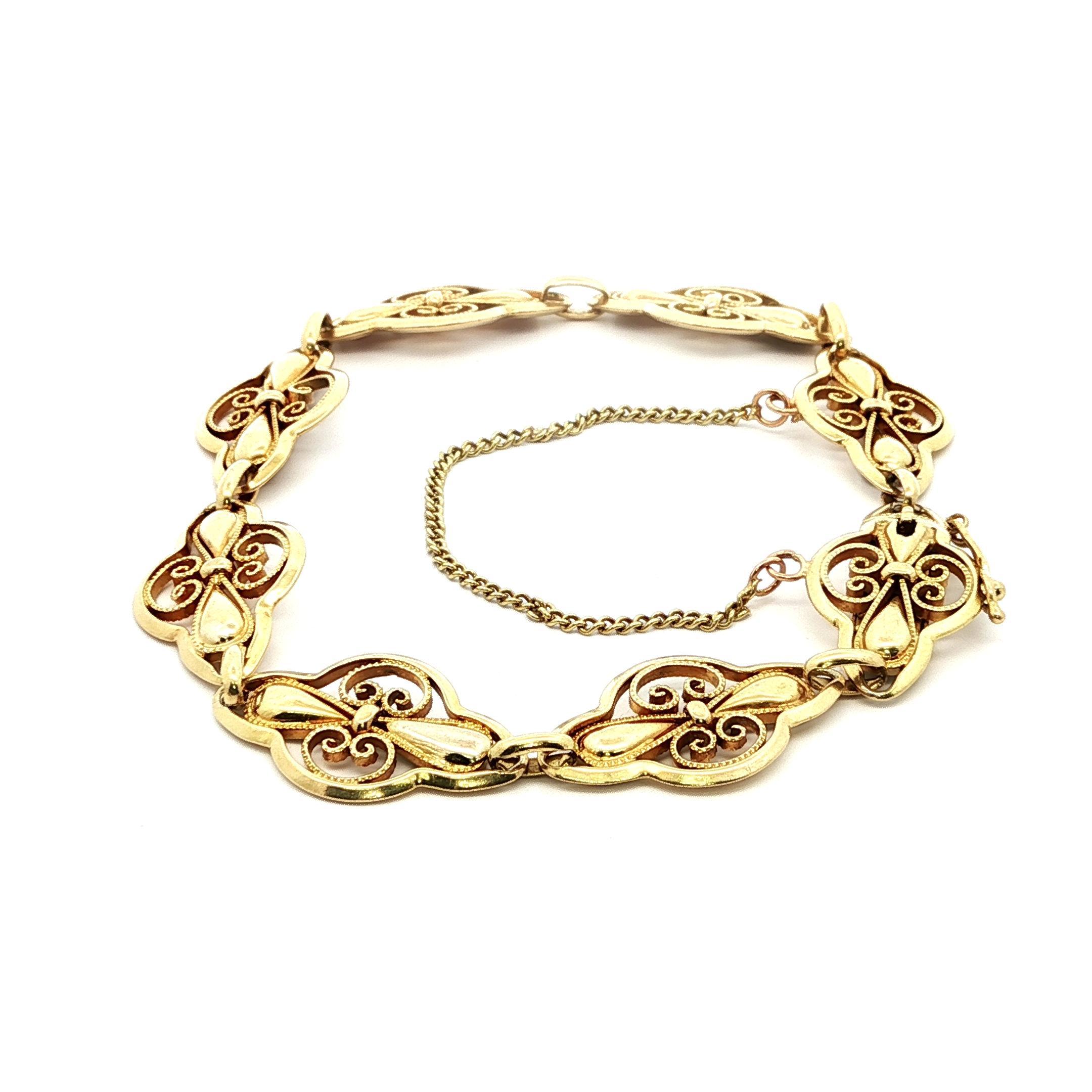Bracciale d'epoca francese in oro giallo 18 carati con lavorazione floreale a mano unica A Link in vendita 1