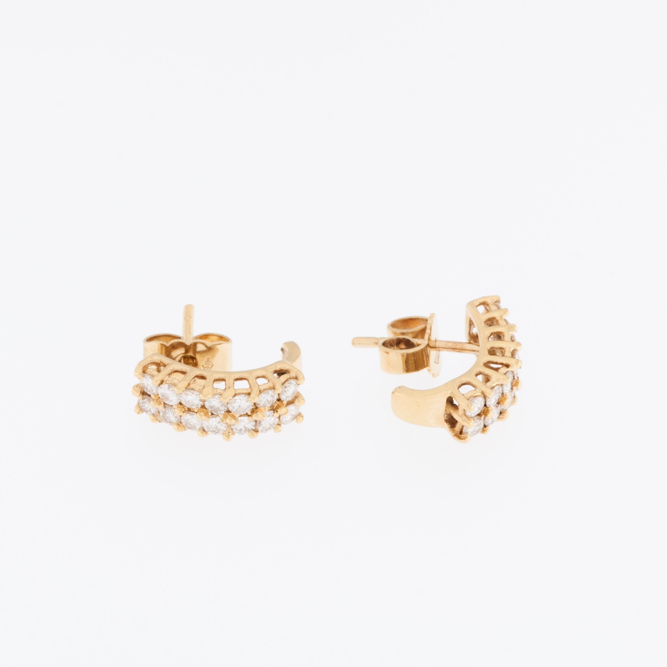 Vintage French 18kt Yellow Gold Earrings with Diamonds are a stunning and timeless piece of jewelry that combines the elegance of vintage design with the beauty of diamonds and the richness of 18-karat yellow gold. 

These earrings are crafted from